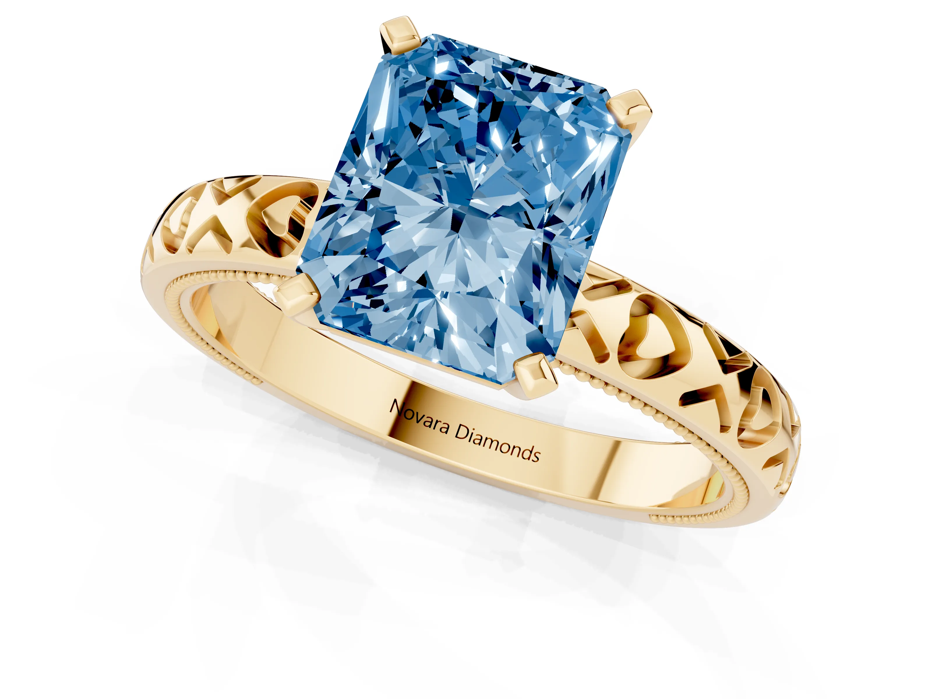 Fancy Blue Radiant Cut Diamond Solitaire Engagement Ring Set in Yellow gold with XO Engraved Band and Prong Setting