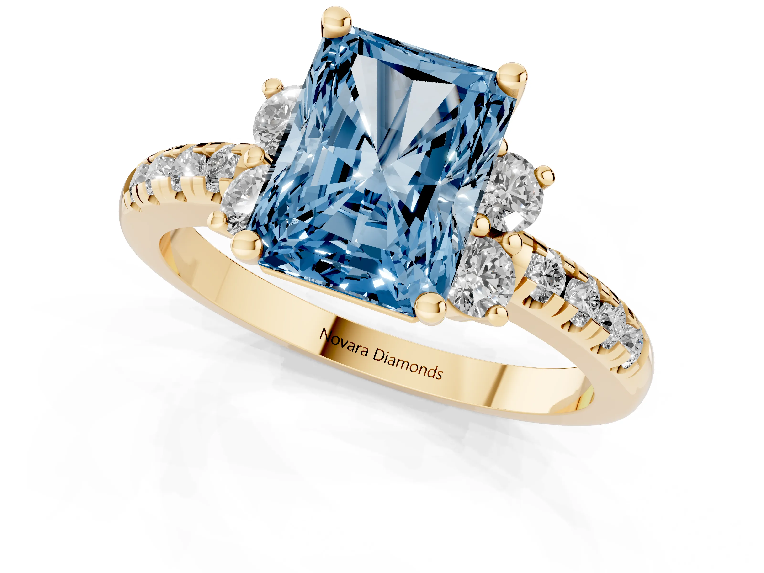 Fancy Blue Radiant Cut Diamond Three-Stone Pavé Ring Set in Yellow gold with Prong Setting
