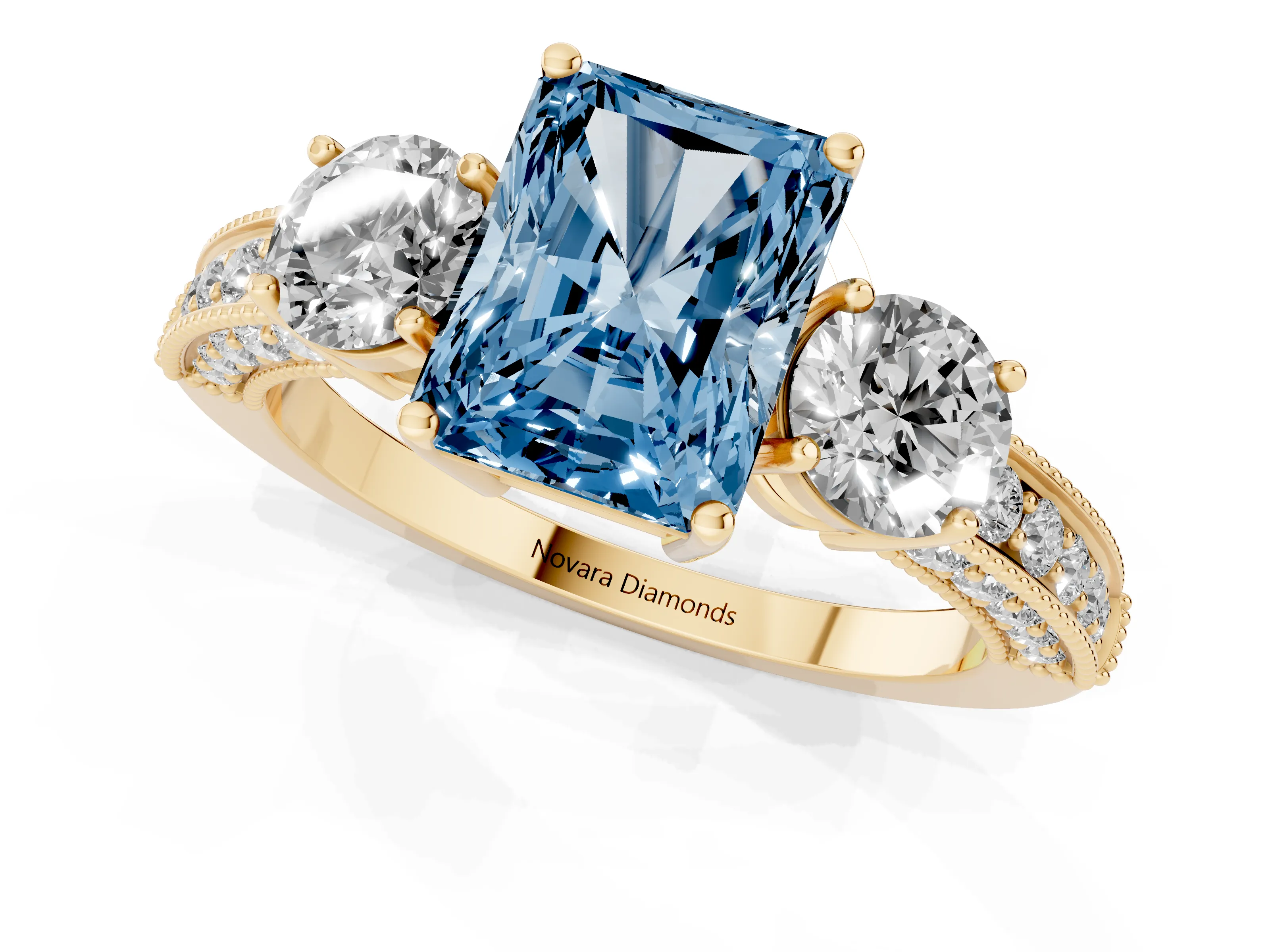 Fancy Blue Radiant Cut Diamond Three-Stone Ring Set in Yellow gold with Round Side Stones and Pavé Band