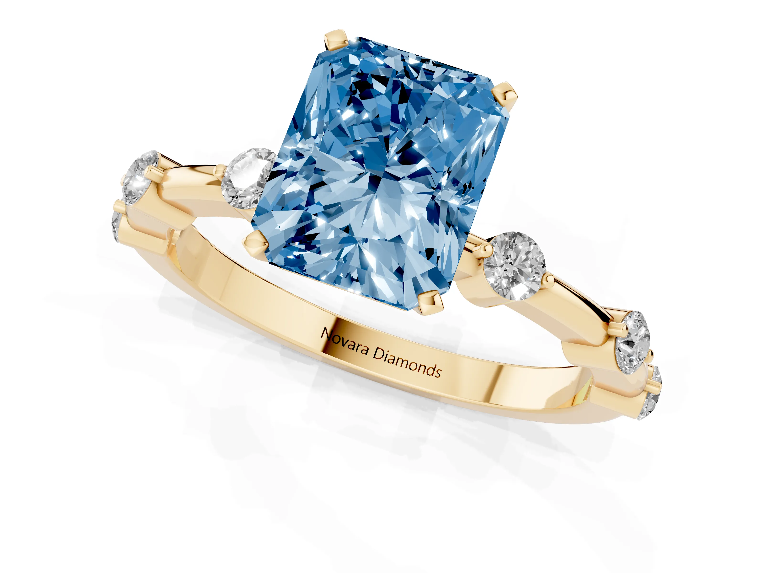 Fancy Blue Radiant Cut Diamond Solitaire Ring Set in Yellow gold with Bezel Set Side Stones and Prong Setting