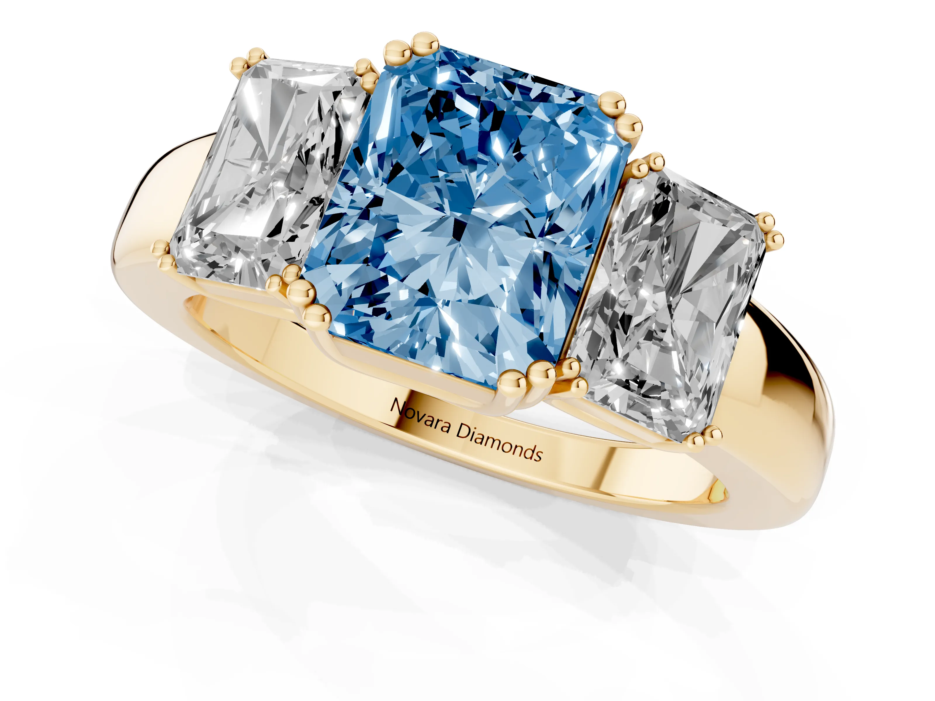 Fancy Blue Radiant Cut Diamond Three-Stone Ring Set in Yellow gold with Polished Channel-Set Band