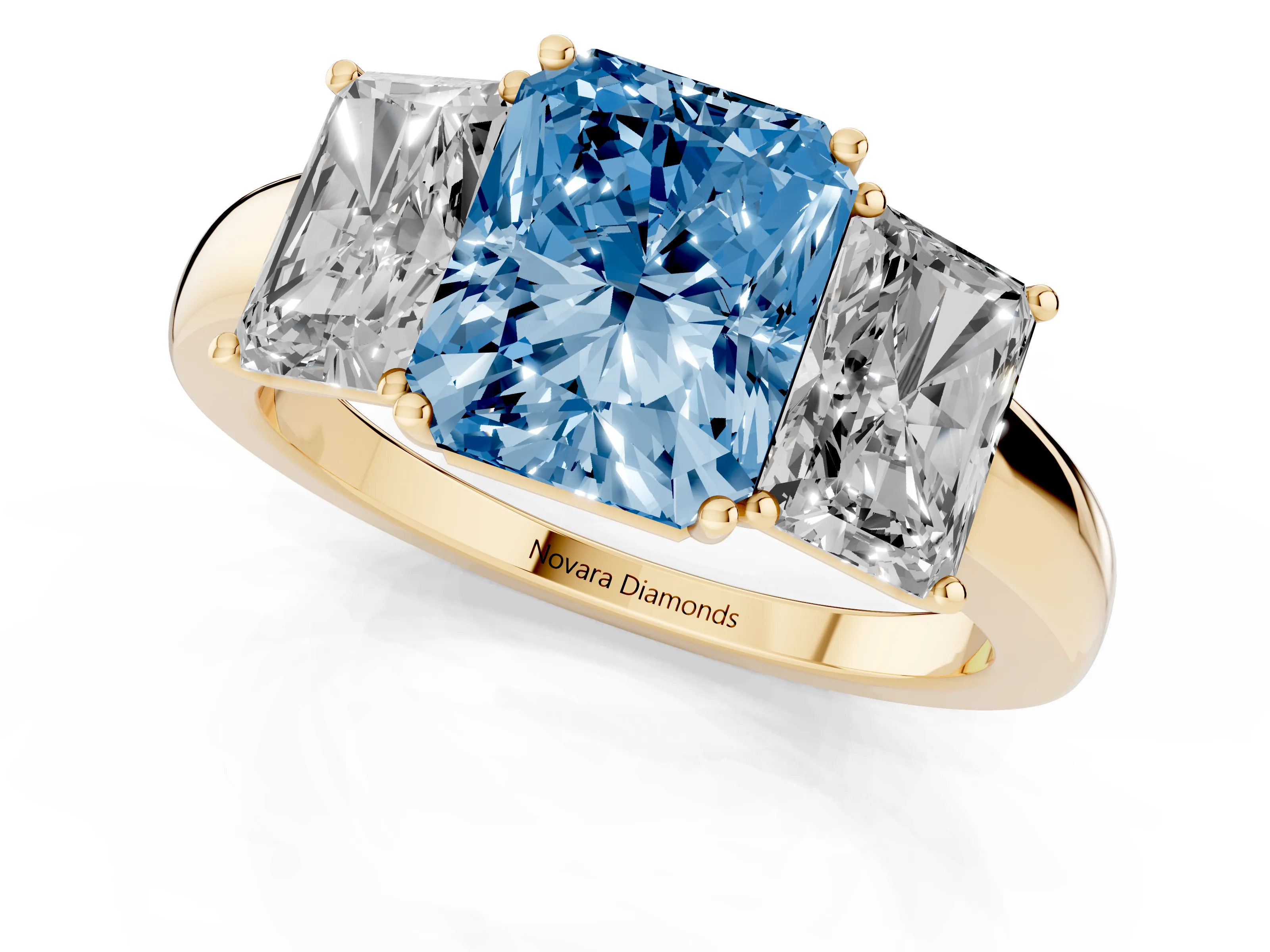 Fancy Blue Radiant Cut Diamond Three-Stone Ring Set in Yellow gold with Bold Center and Classic Band