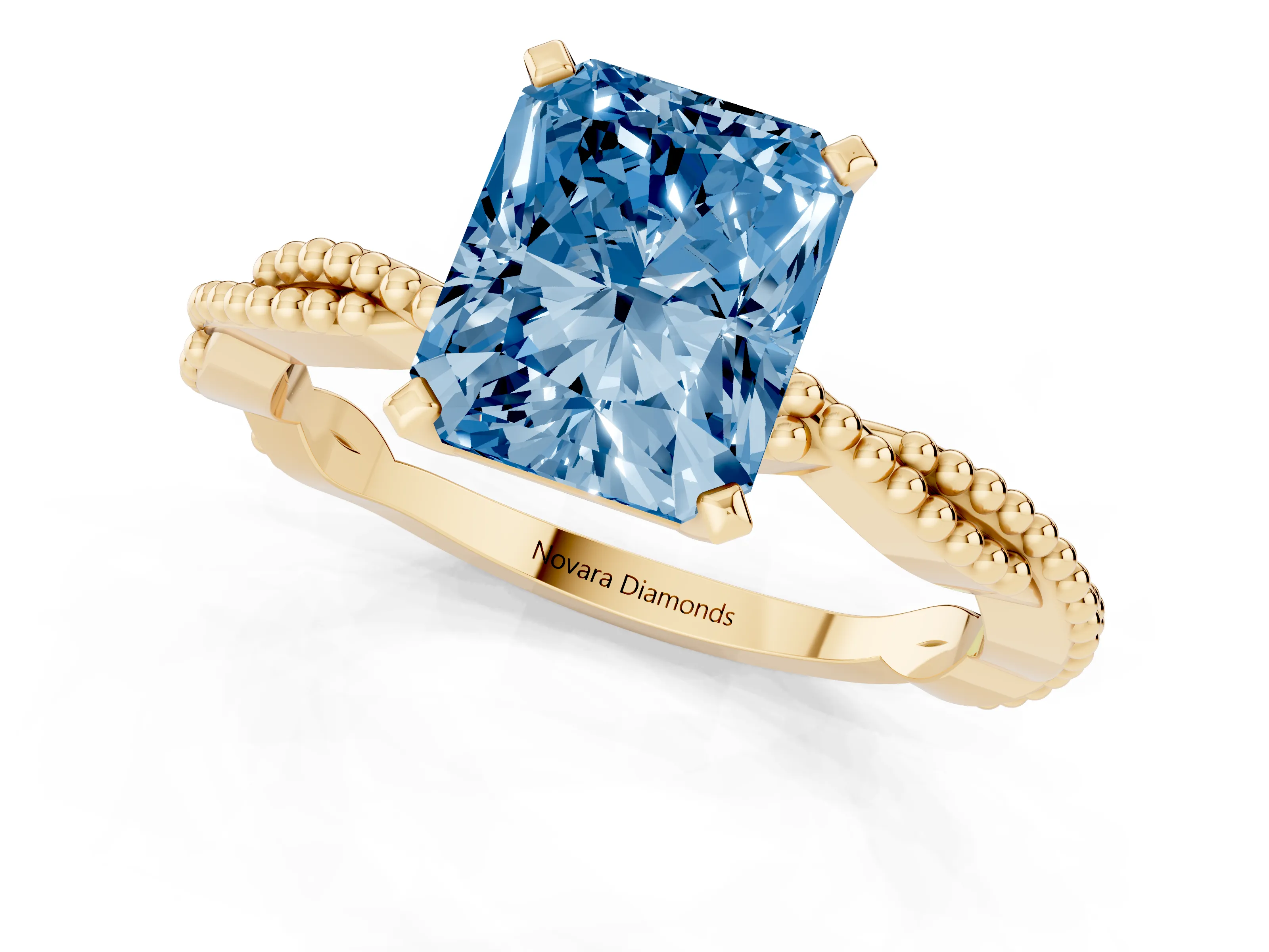 Fancy Blue Radiant Cut Diamond Solitaire Ring Set in Yellow gold with Twisted Band and Bead Prong Setting