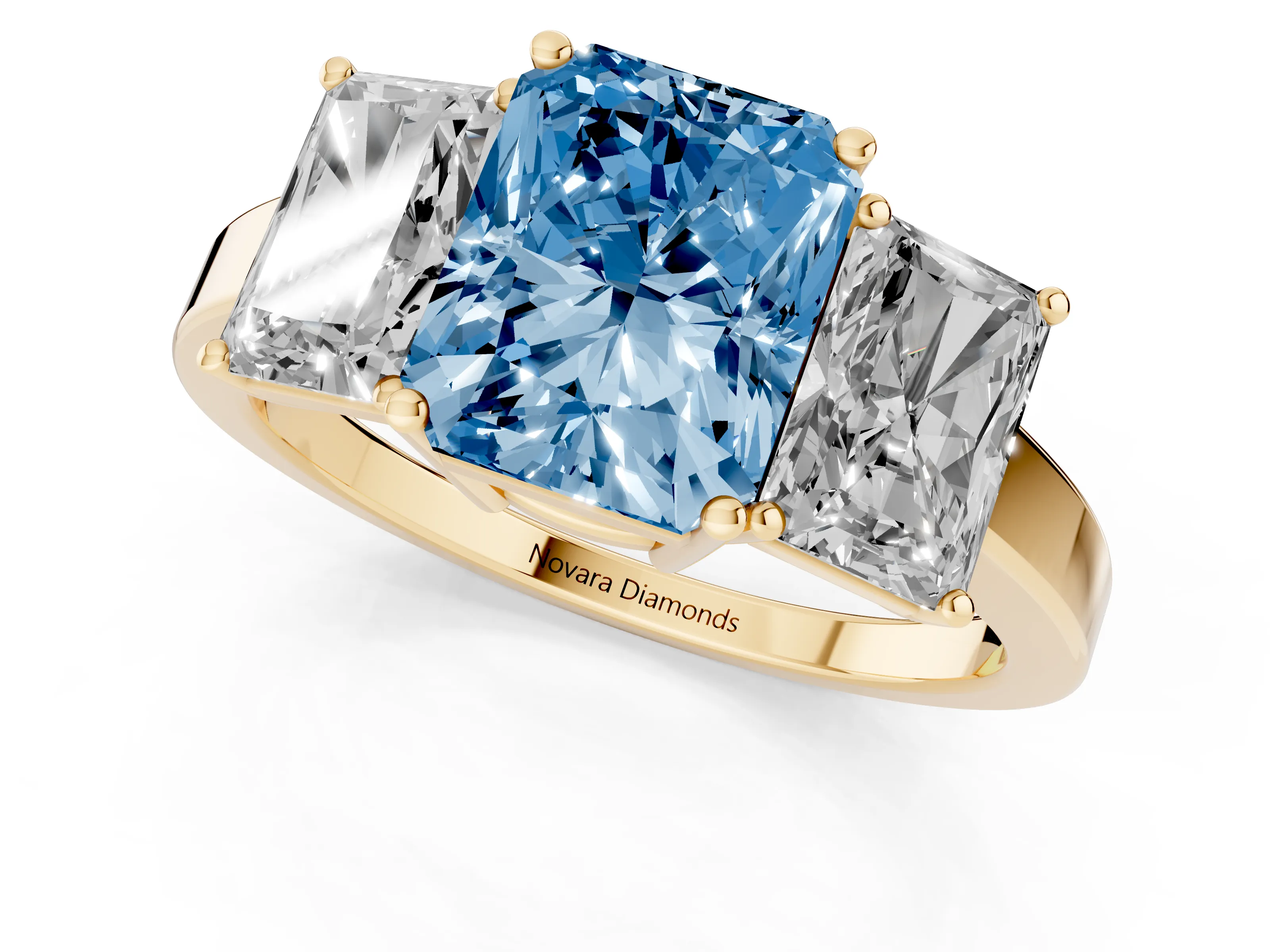 Fancy Blue Radiant Cut Diamond Three-Stone Engagement Ring Set in Yellow gold with Flat Band
