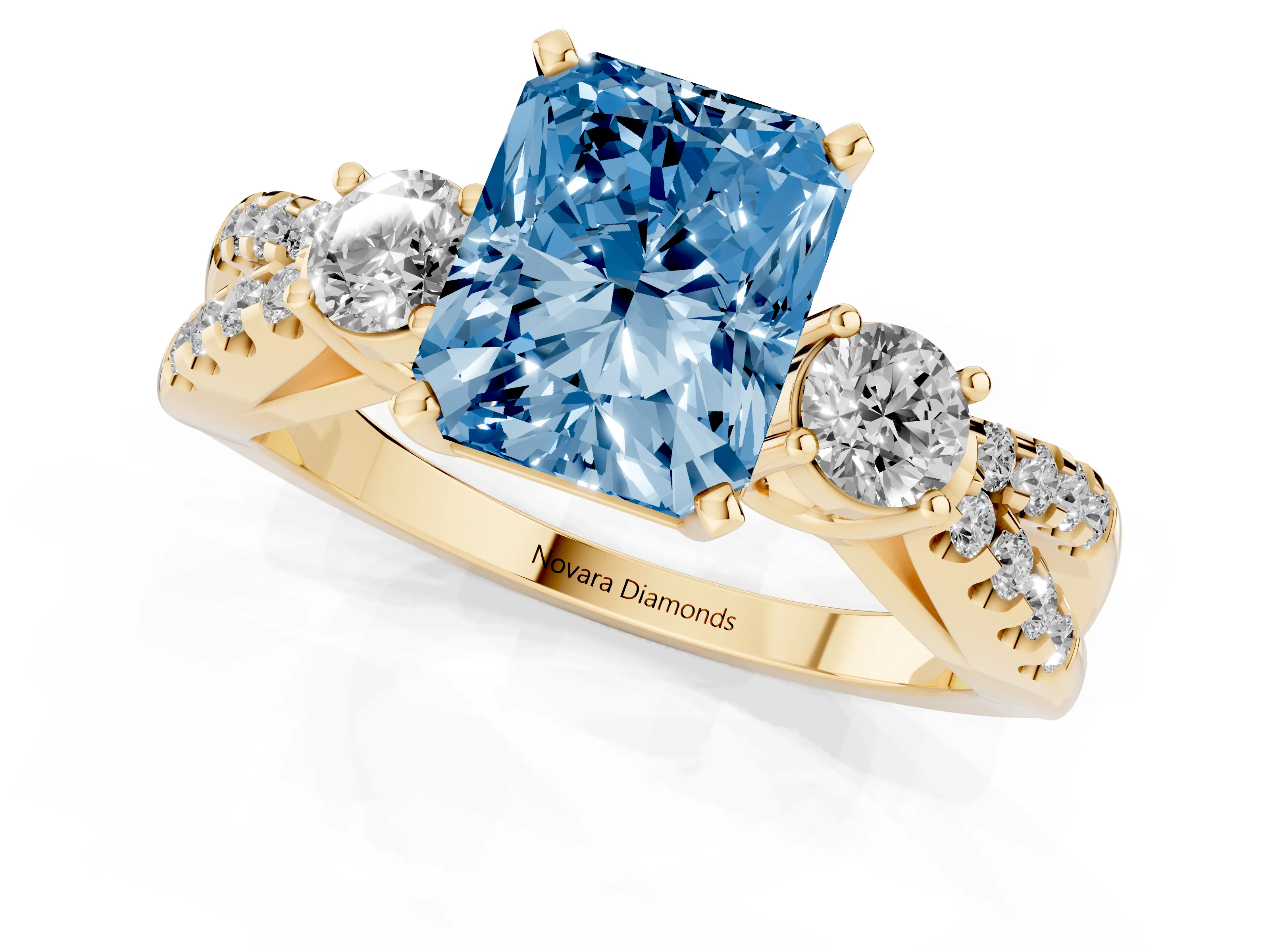 Fancy Blue Radiant Cut Diamond Three-Stone Ring Set in Yellow gold with Pavé Split Shank and Prong Setting