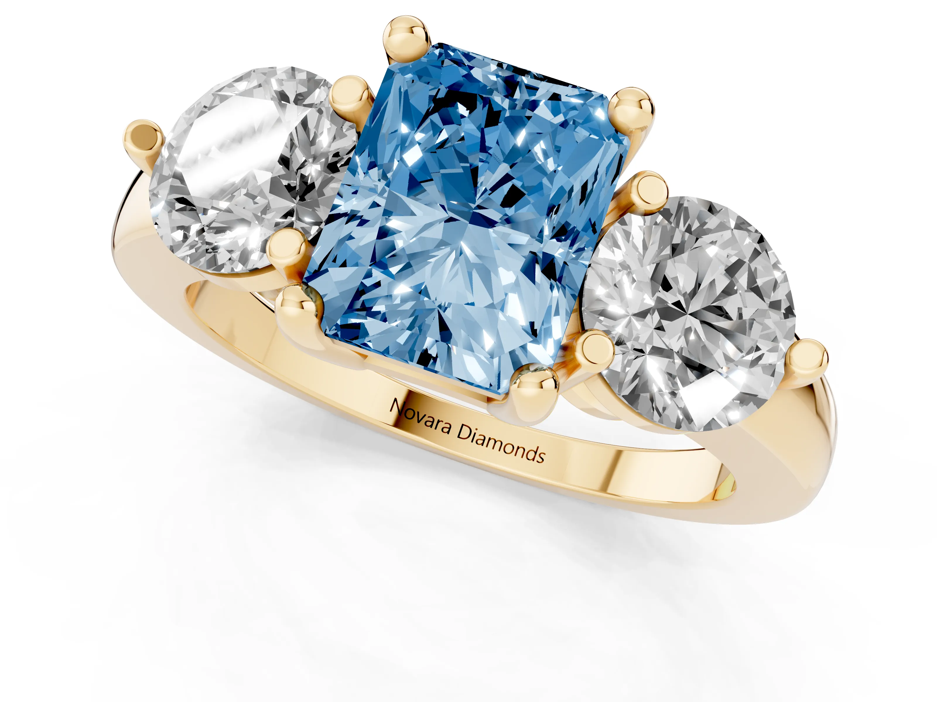 Fancy Blue Radiant Cut Diamond Three-Stone Ring Set in Yellow gold with Prong Setting and Classic Band