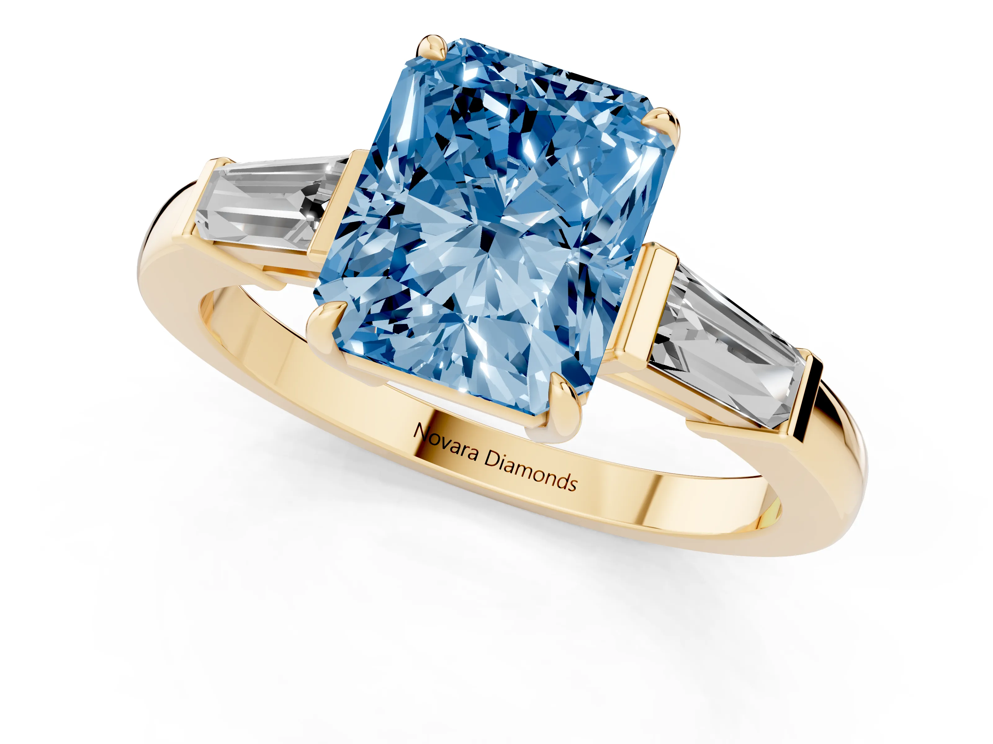 Fancy Blue Radiant Cut Diamond Three-Stone Ring Set in Yellow gold with Tapered Baguette Side Stones and Prong Setting