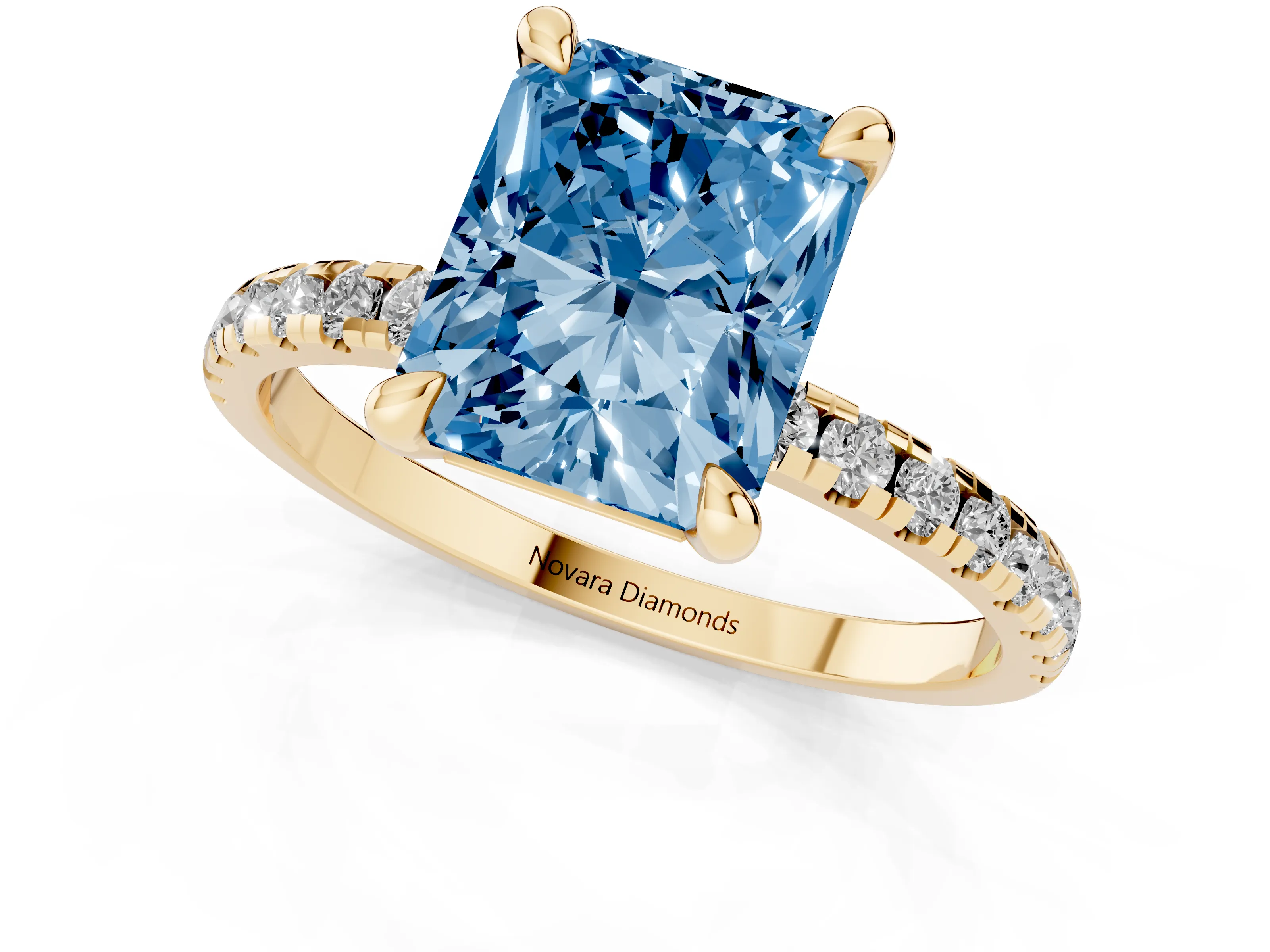 Fancy Blue Radiant Cut Diamond Brilliant Solitaire Ring Set in Yellow gold with Pavé Band and Prong Setting
