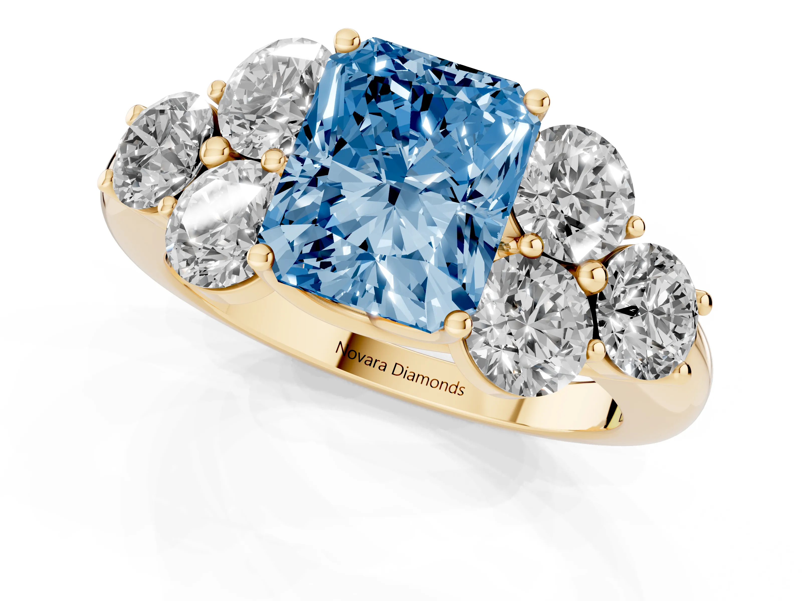 Fancy Blue Radiant Cut Diamond Cluster Ring Set in Yellow gold with Round Accent Stones and Prong Setting on a Plain Band