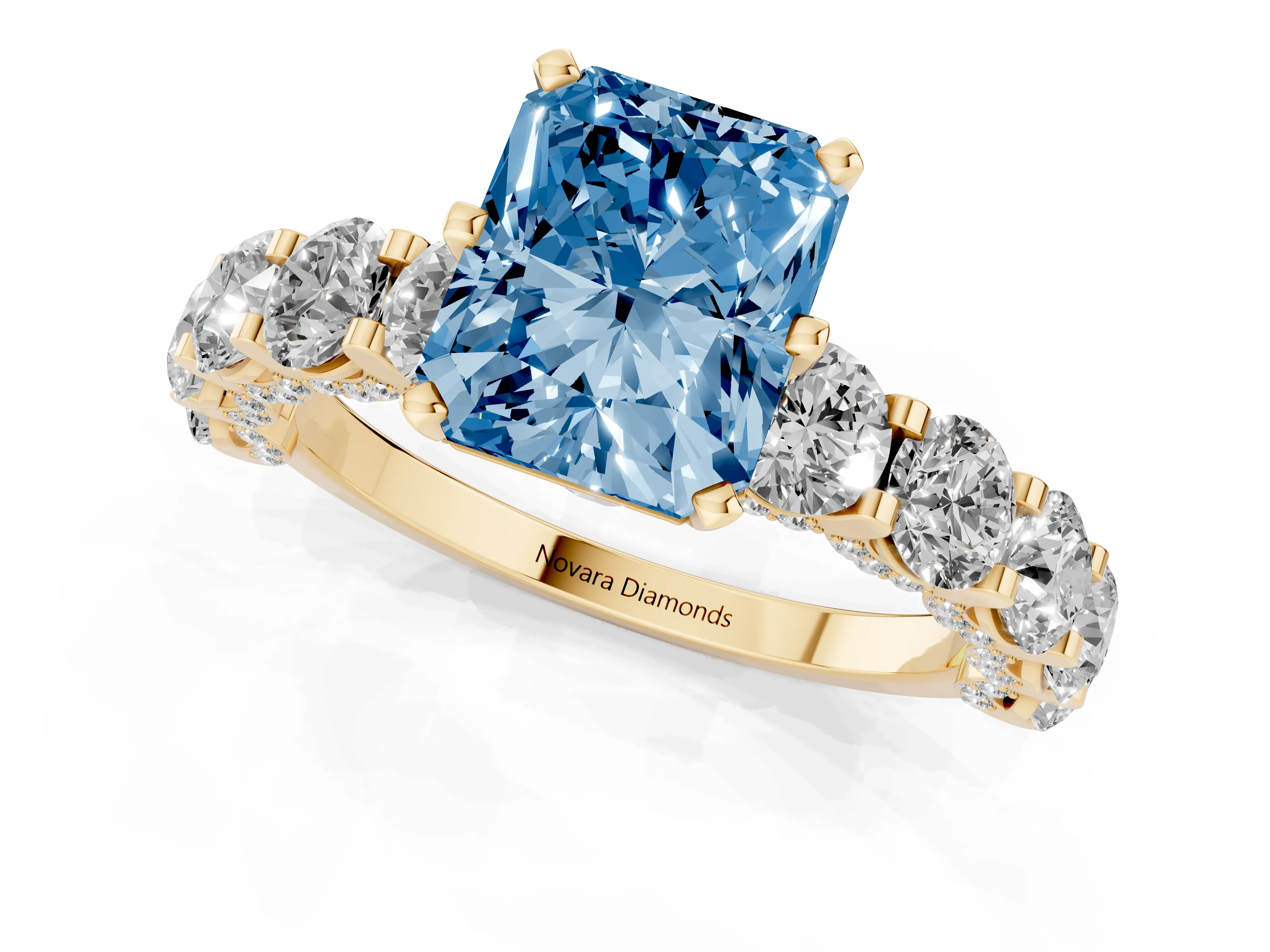 Fancy Blue Radiant Cut Diamond Side Stone Ring Set in Yellow gold with Alternating Round and Oval Side Stones – second view