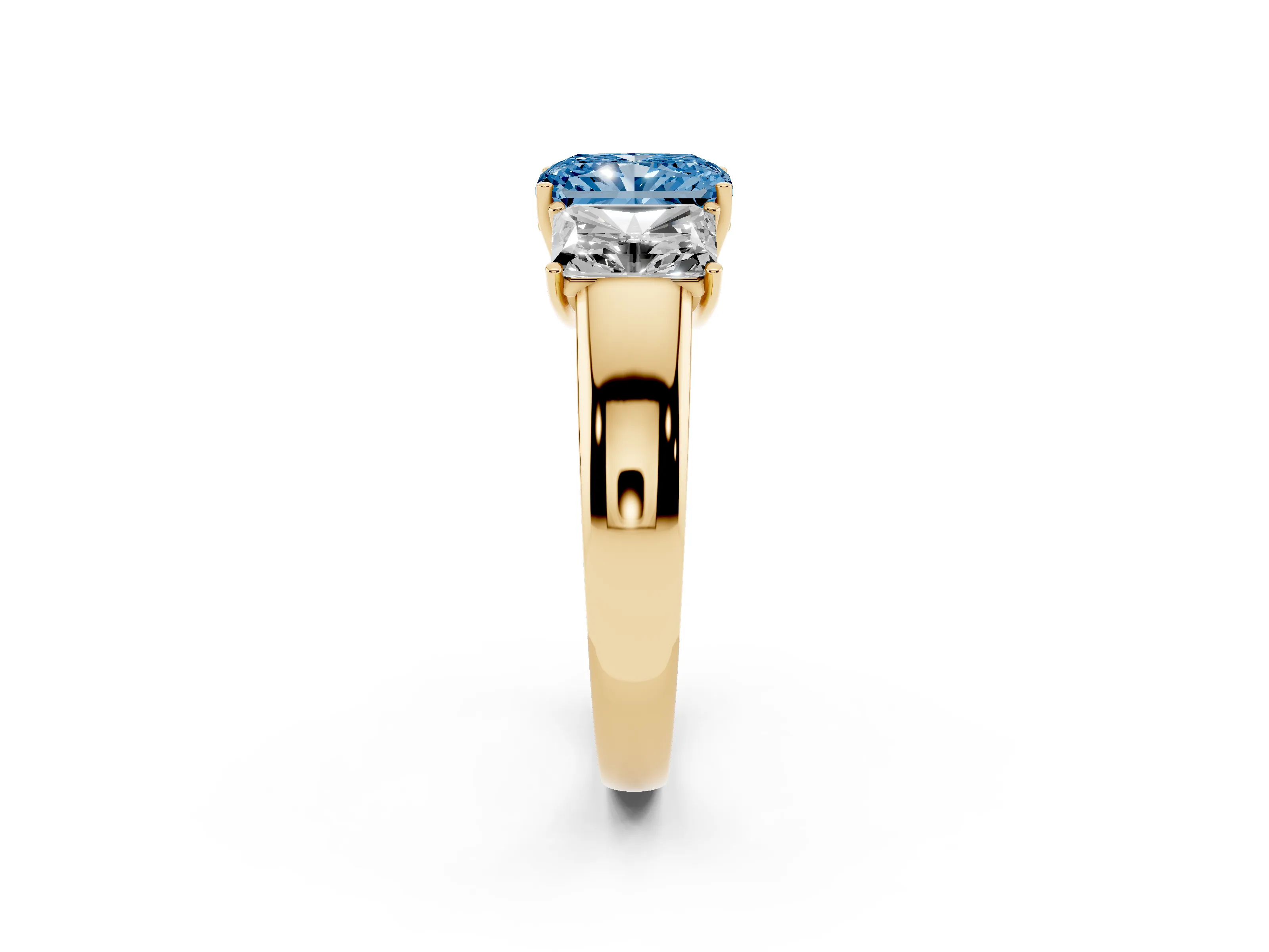 Fancy Blue Three-Stone Radiant Cut Diamond Ring Set in Yellow gold with Matching Prong Settings and Plain Band