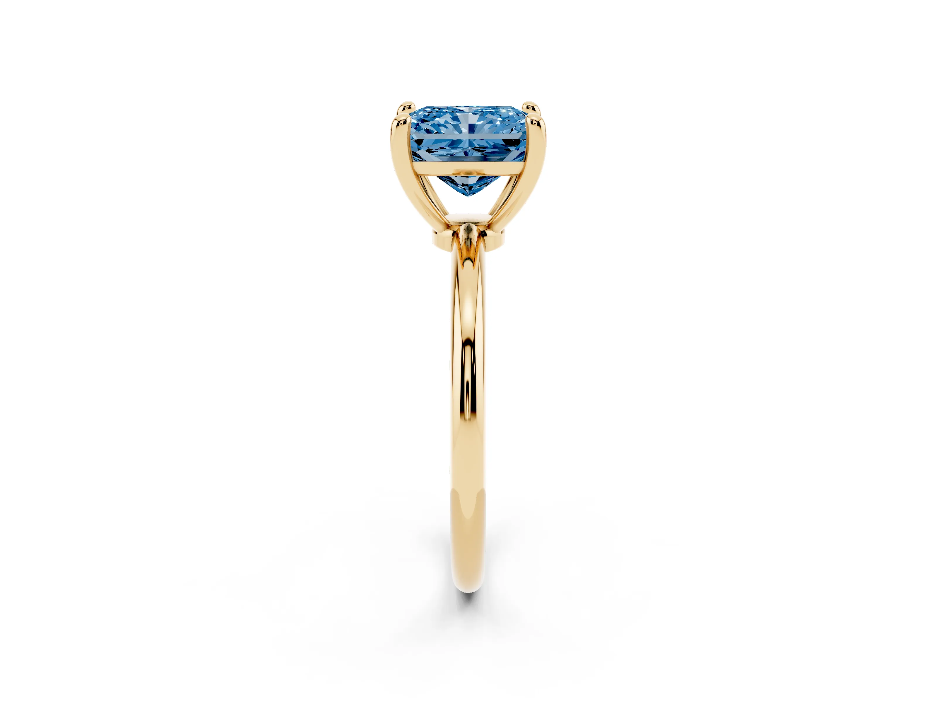 Fancy Blue Radiant Cut Diamond Solitaire Ring Set in Yellow gold with Secure Prong Setting on a Classic Band