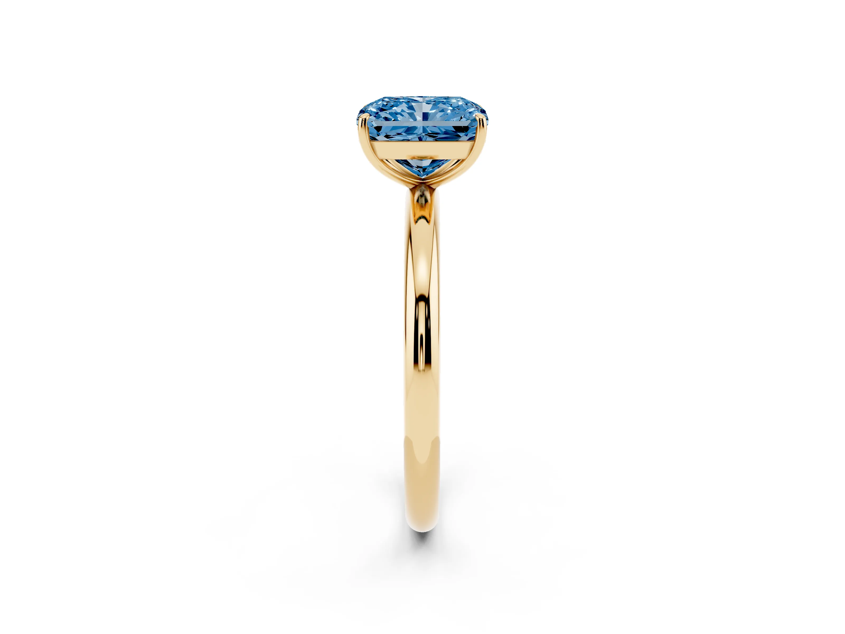 Fancy Blue Radiant Cut Diamond Solitaire Ring Set in Yellow gold with Prong Setting on a Polished Plain Band