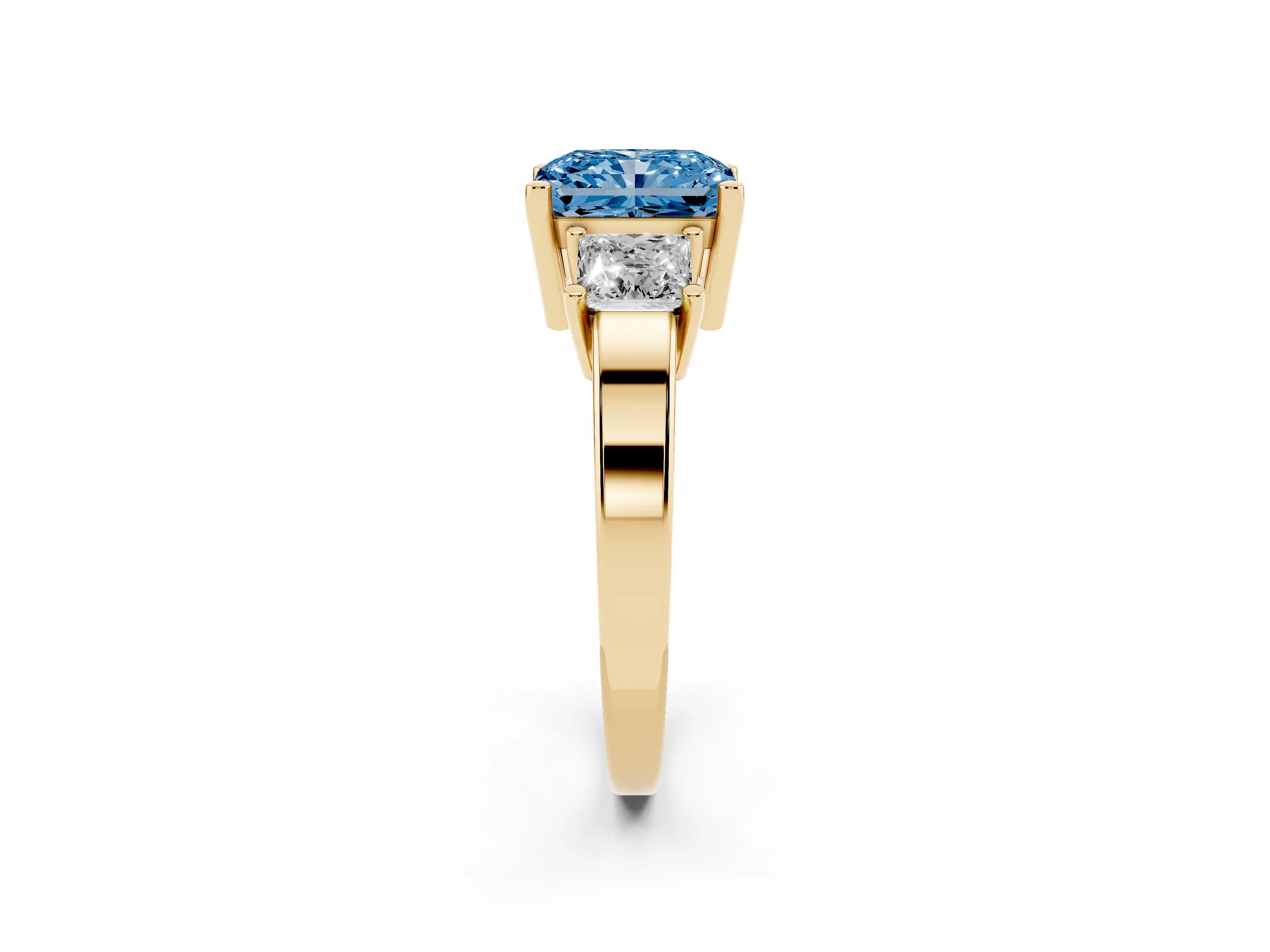 Fancy Blue Three-Stone Radiant Cut Diamond Solitaire Ring Set in Yellow gold with Prong Setting