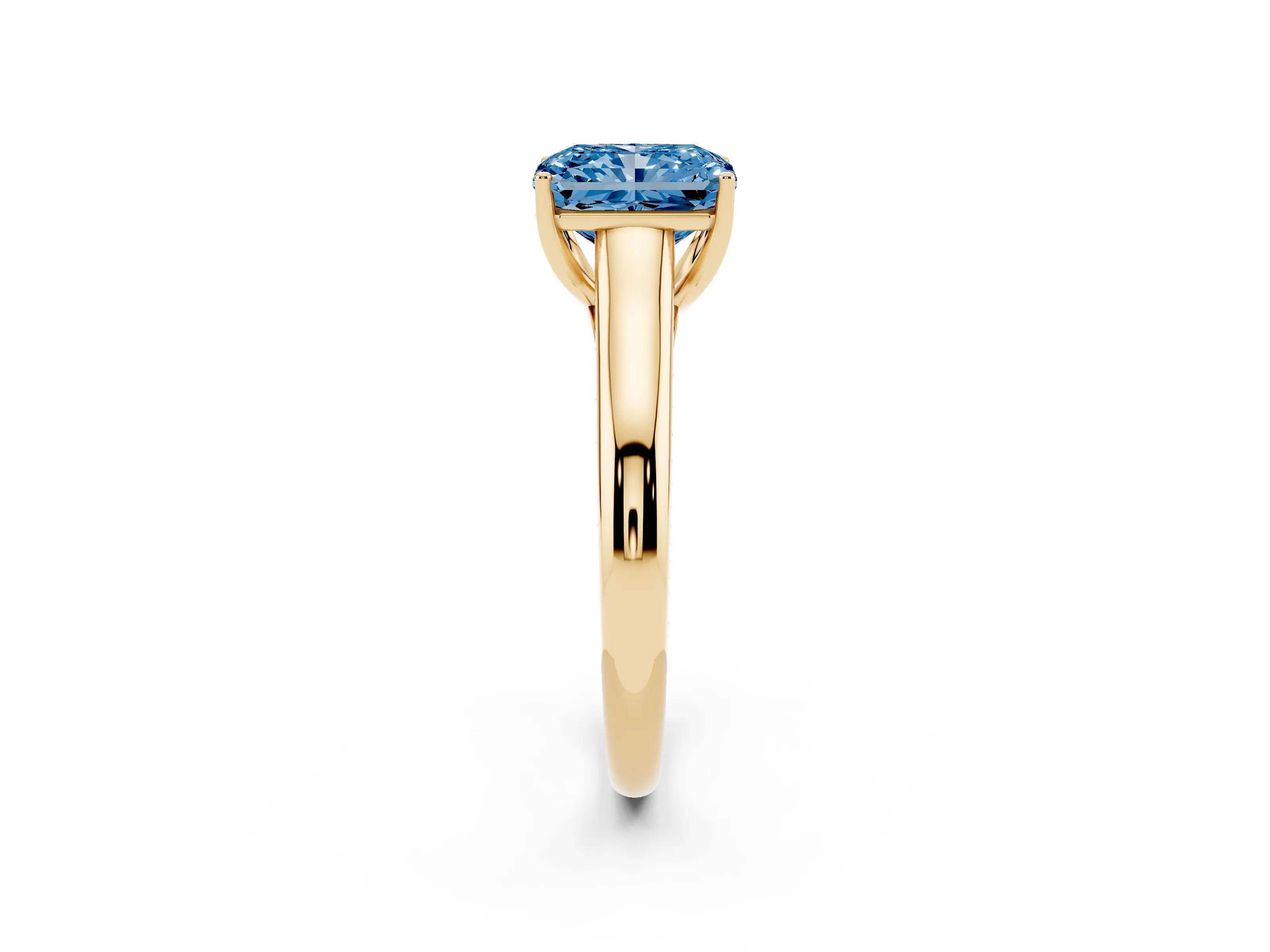 Fancy Blue Radiant Cut Diamond Solitaire Engagement Ring Set in Yellow gold with Subtly Tapered Band and Prong Setting