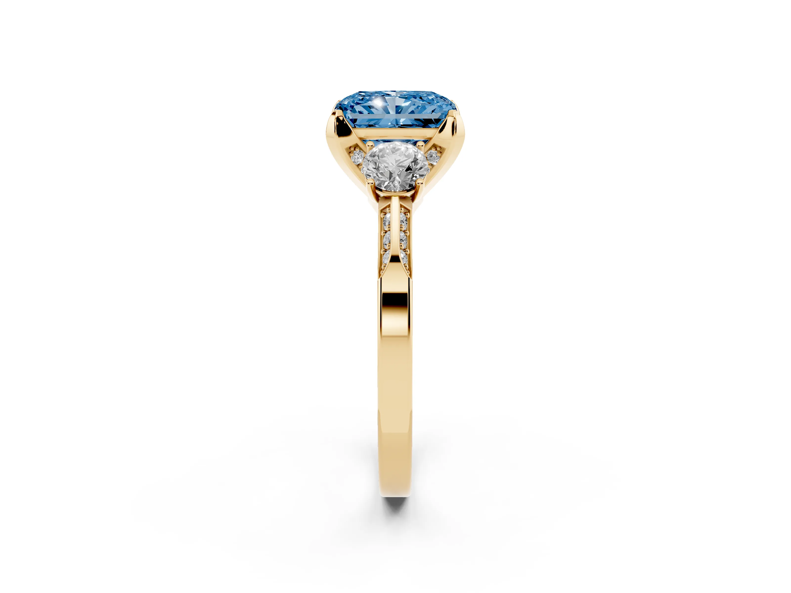 Fancy Blue Radiant Cut Diamond Three-Stone Ring Set in Yellow gold with Pavé Band and Smaller Side Stones