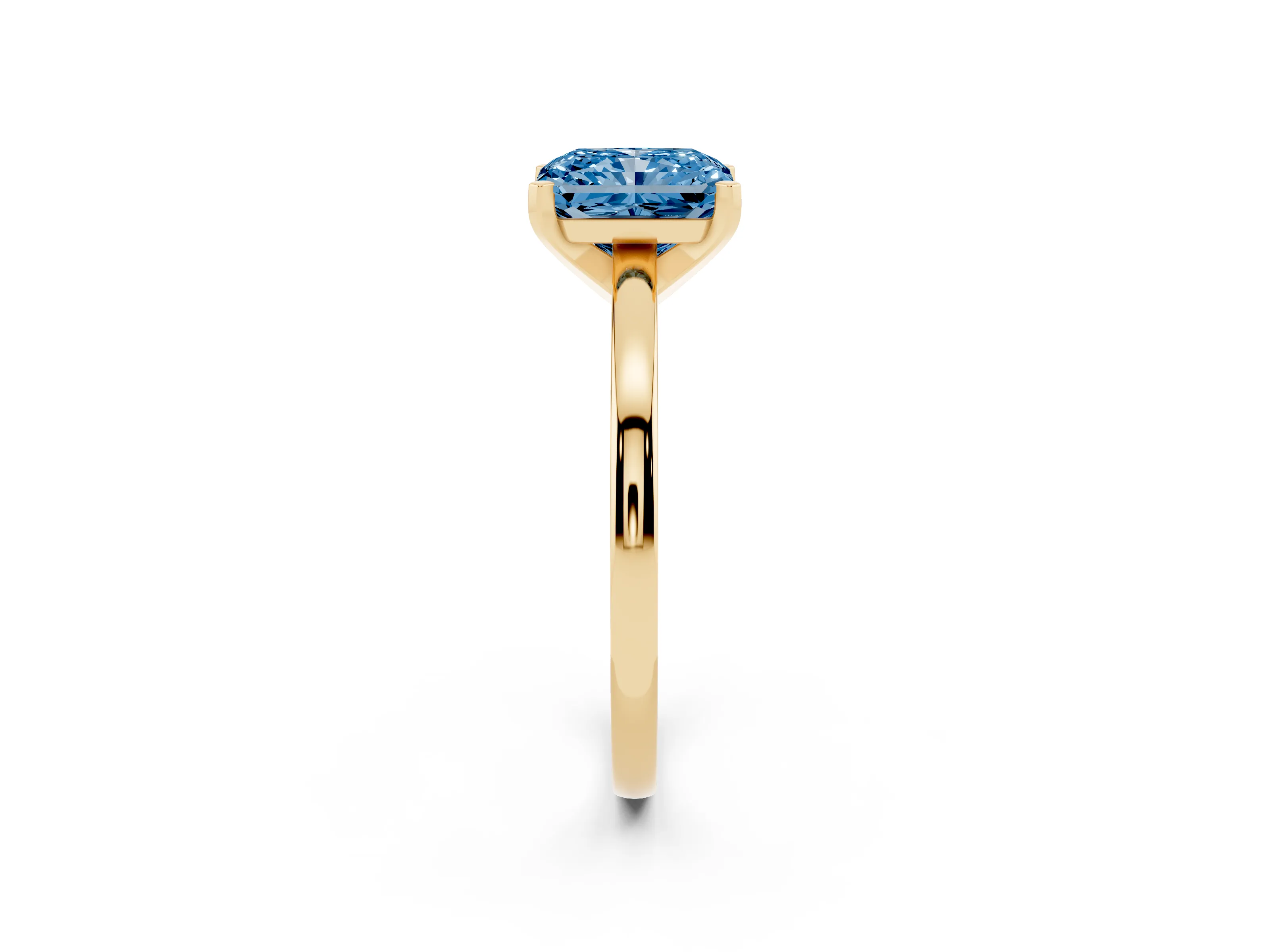Fancy Blue Radiant Cut Diamond Solitaire Engagement Ring Set in Yellow gold with Prong Setting on a Classic Band