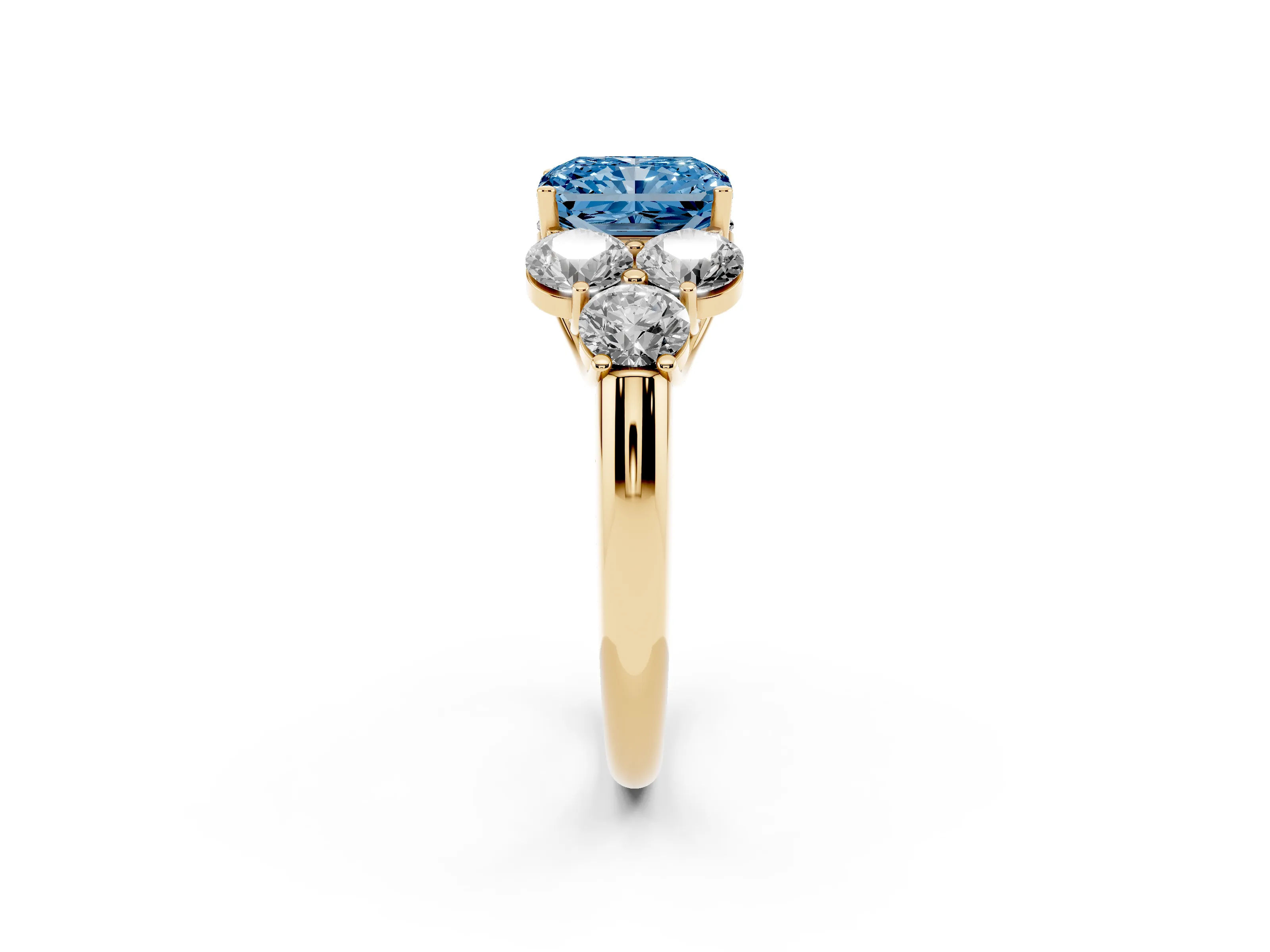 Fancy Blue Radiant Cut Diamond Cluster Ring Set in Yellow gold with Round Accent Stones and Prong Setting on a Plain Band