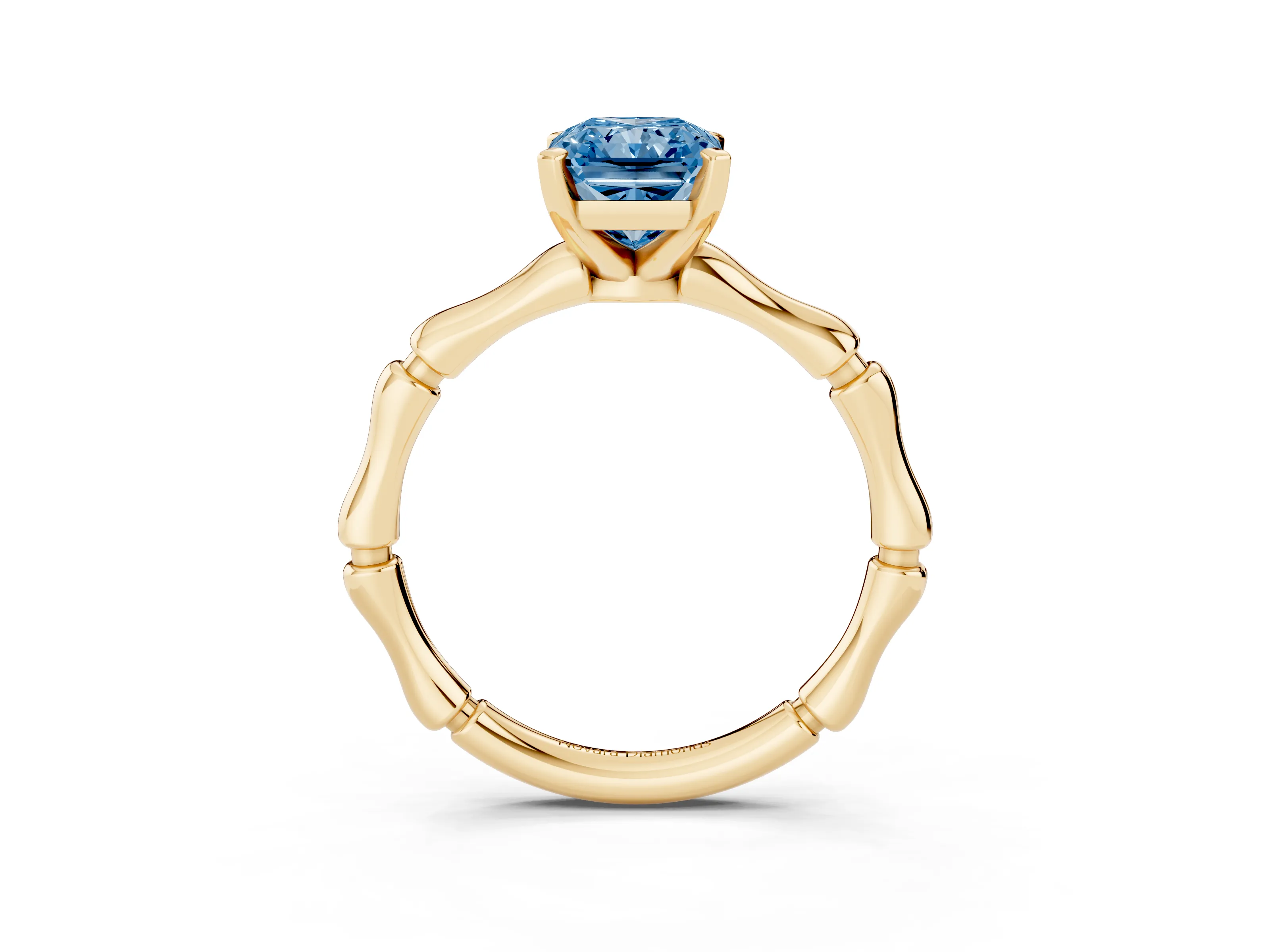 Fancy Blue Radiant Cut Diamond Solitaire Ring Set in Yellow gold with Bamboo Band and Prong Setting