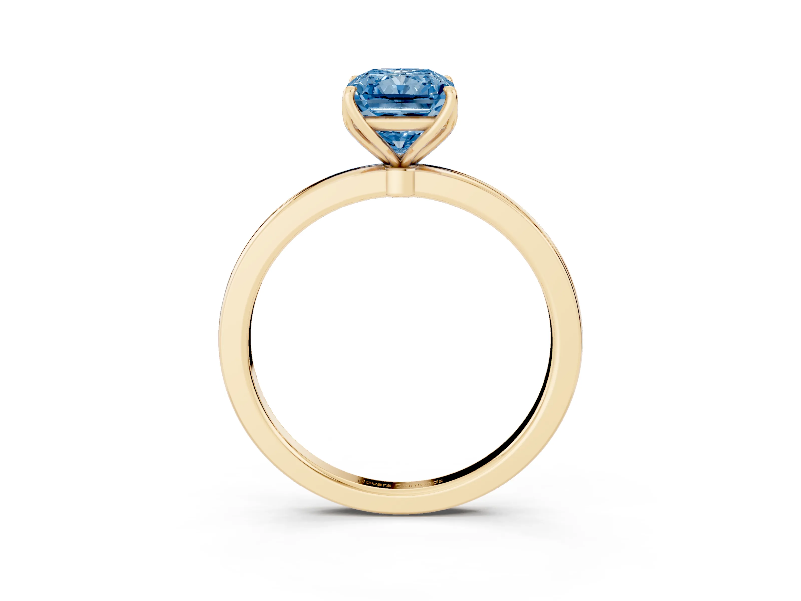 Fancy Blue Radiant Cut Diamond Solitaire Ring Set in Yellow gold with Prong Setting and Thin Polished Band