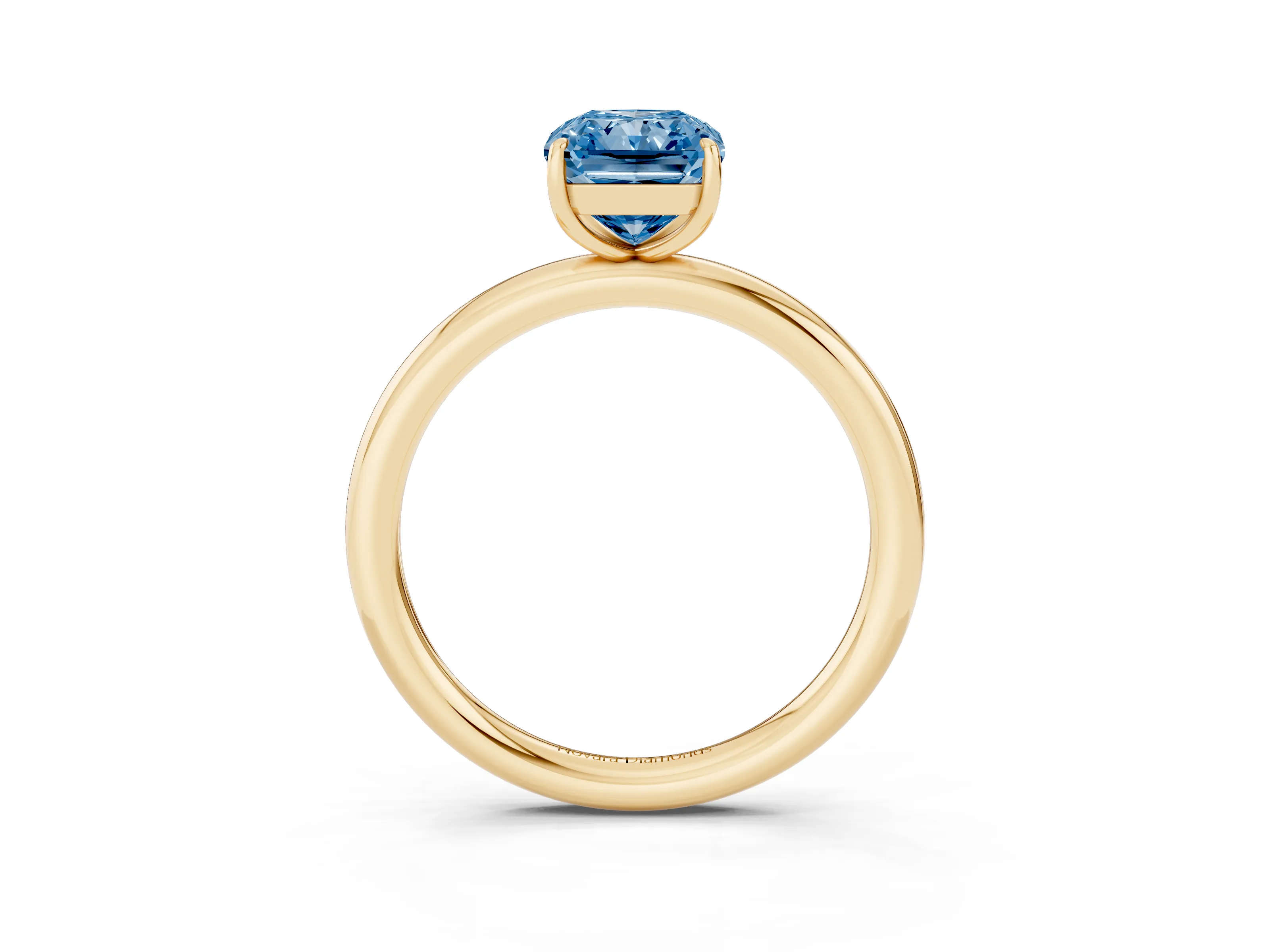 Fancy Blue Radiant Cut Diamond Solitaire Ring Set in Yellow gold with Prong Setting on a Polished Plain Band