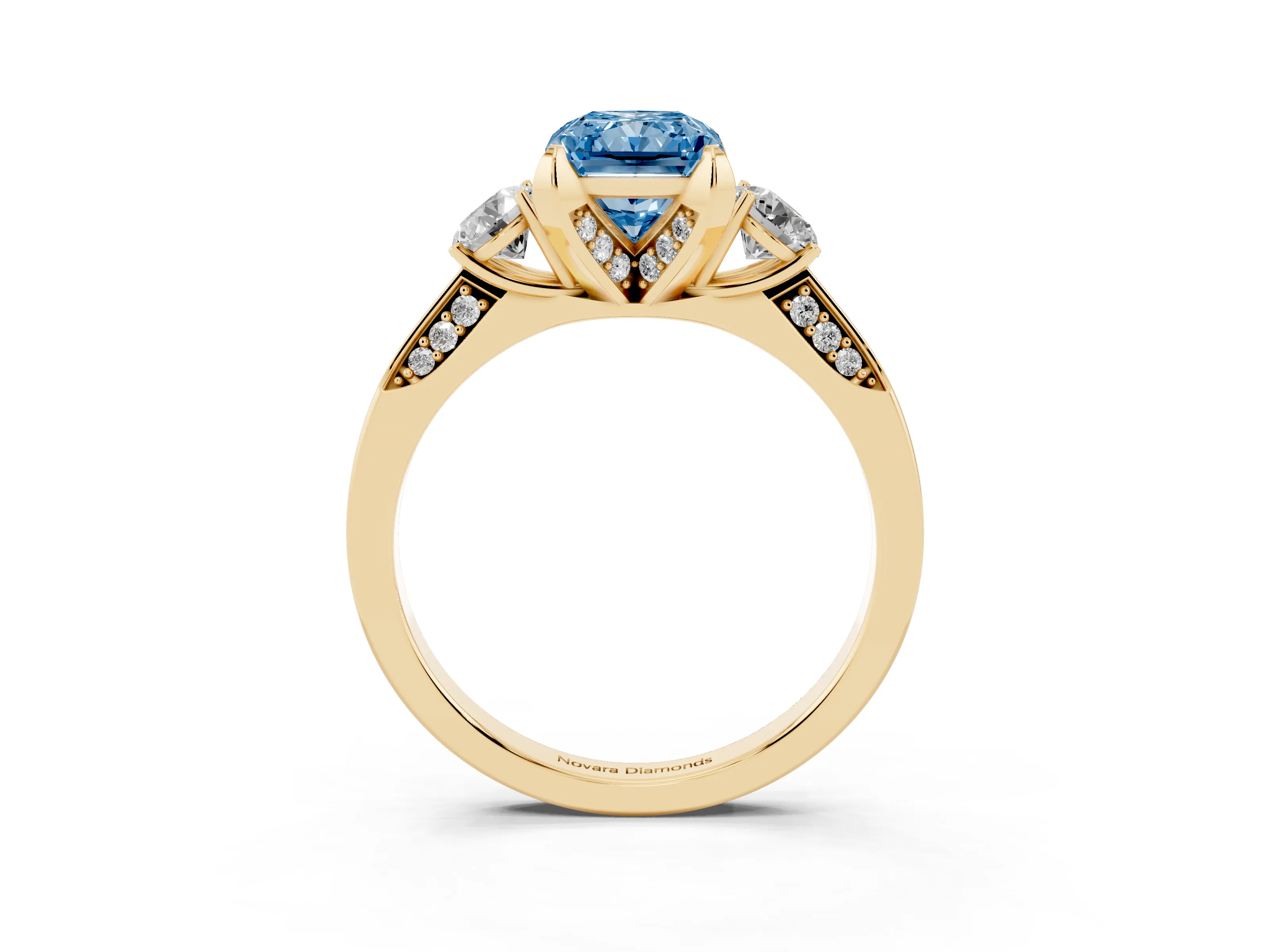 Fancy Blue Radiant Cut Diamond Three-Stone Ring Set in Yellow gold with Pavé Band and Smaller Side Stones