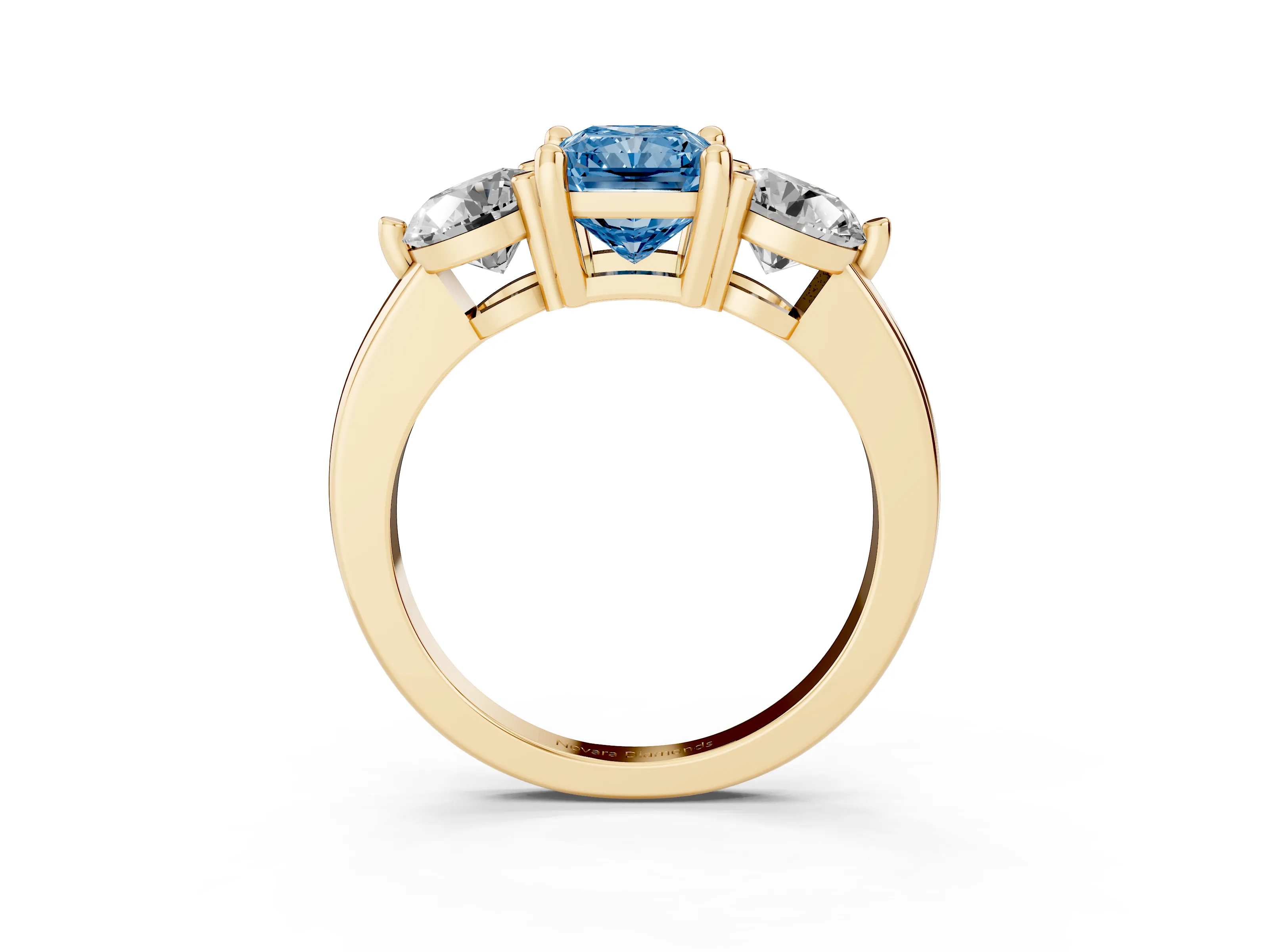 Fancy Blue Radiant Cut Diamond Three-Stone Ring Set in Yellow gold with Prong Setting and Classic Band