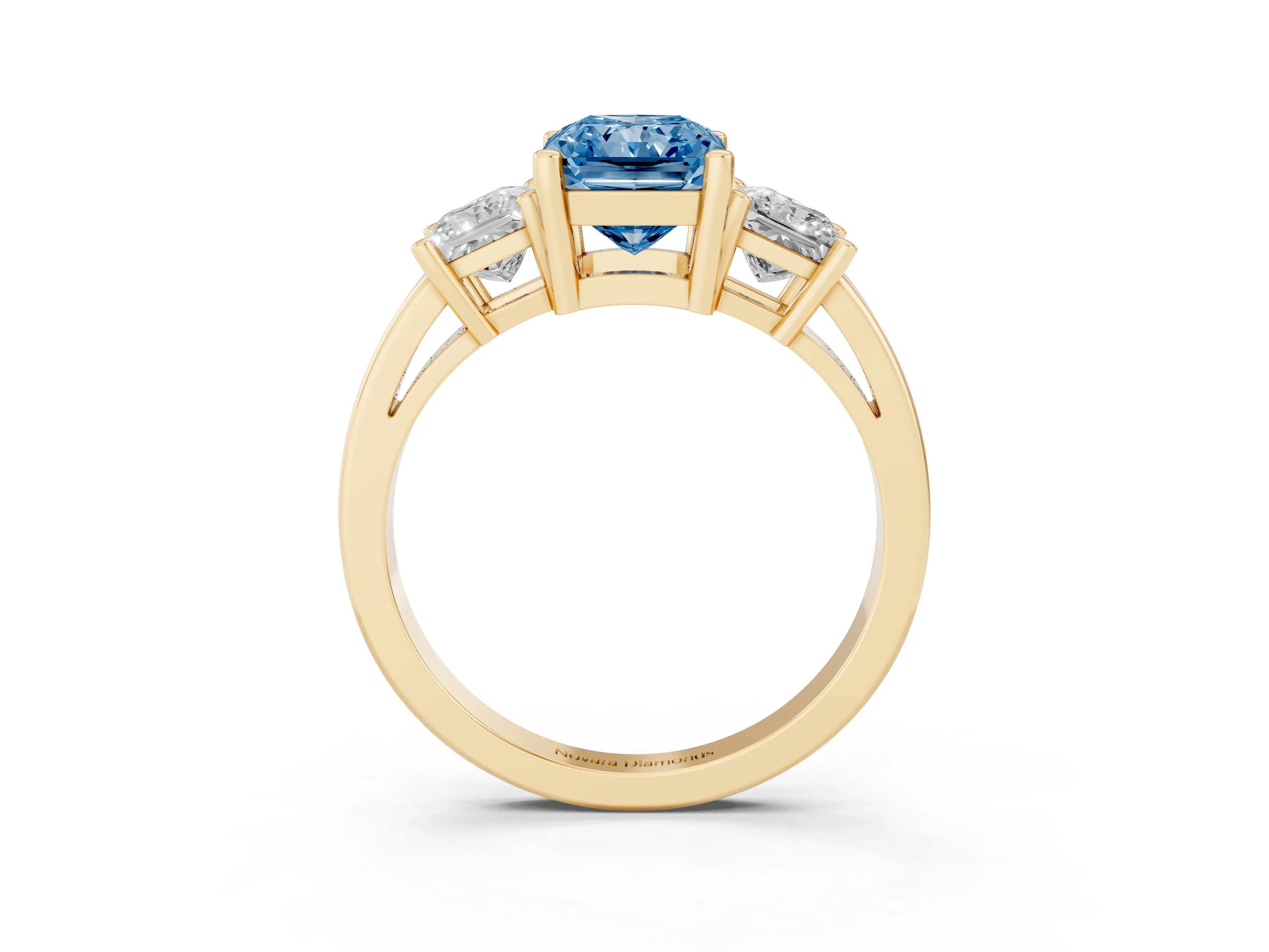 Fancy Blue Three-Stone Radiant Cut Diamond Solitaire Ring Set in Yellow gold with Prong Setting