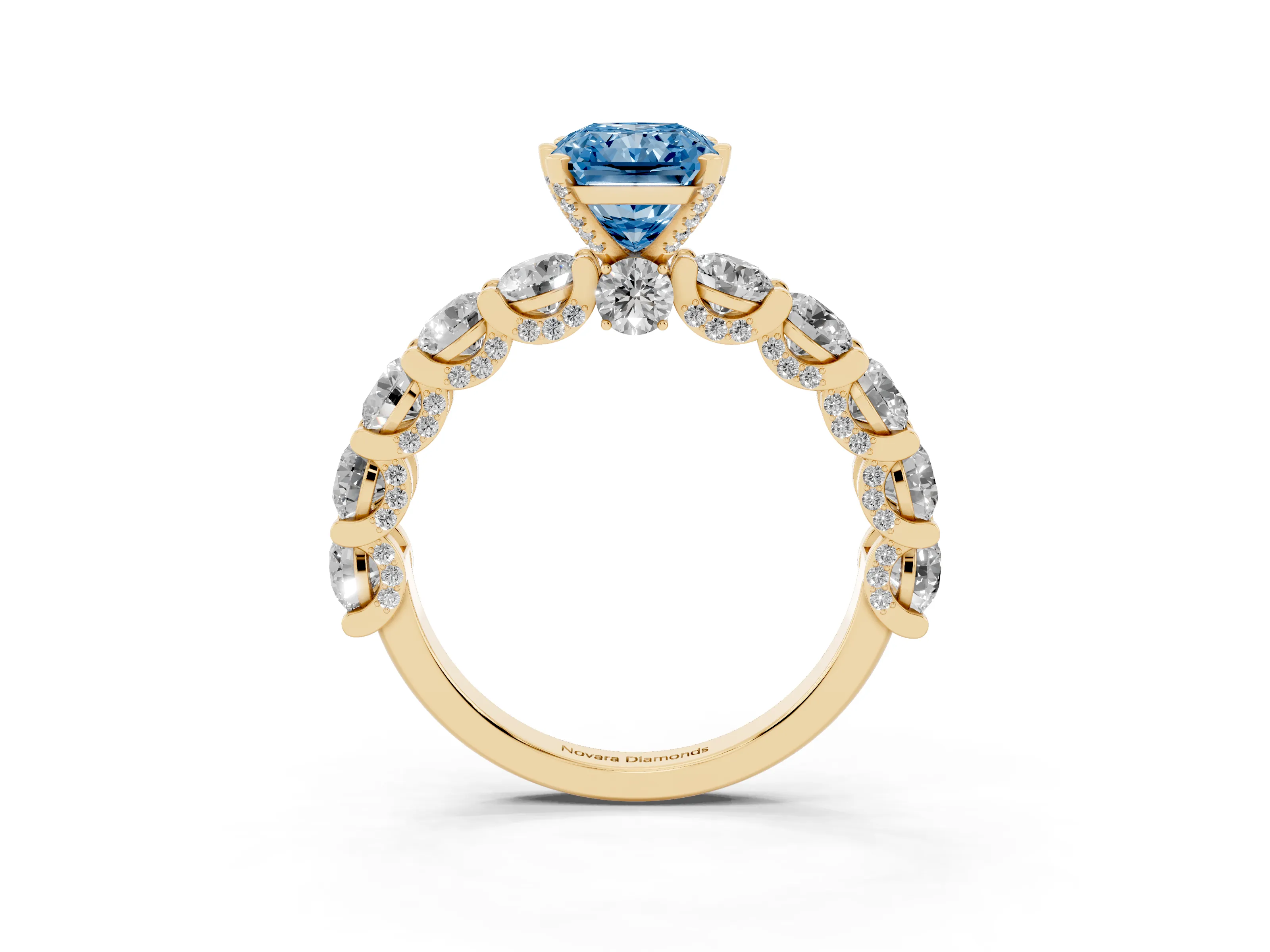 Fancy Blue Radiant Cut Diamond Side Stone Ring Set in Yellow gold with Alternating Round and Oval Side Stones
