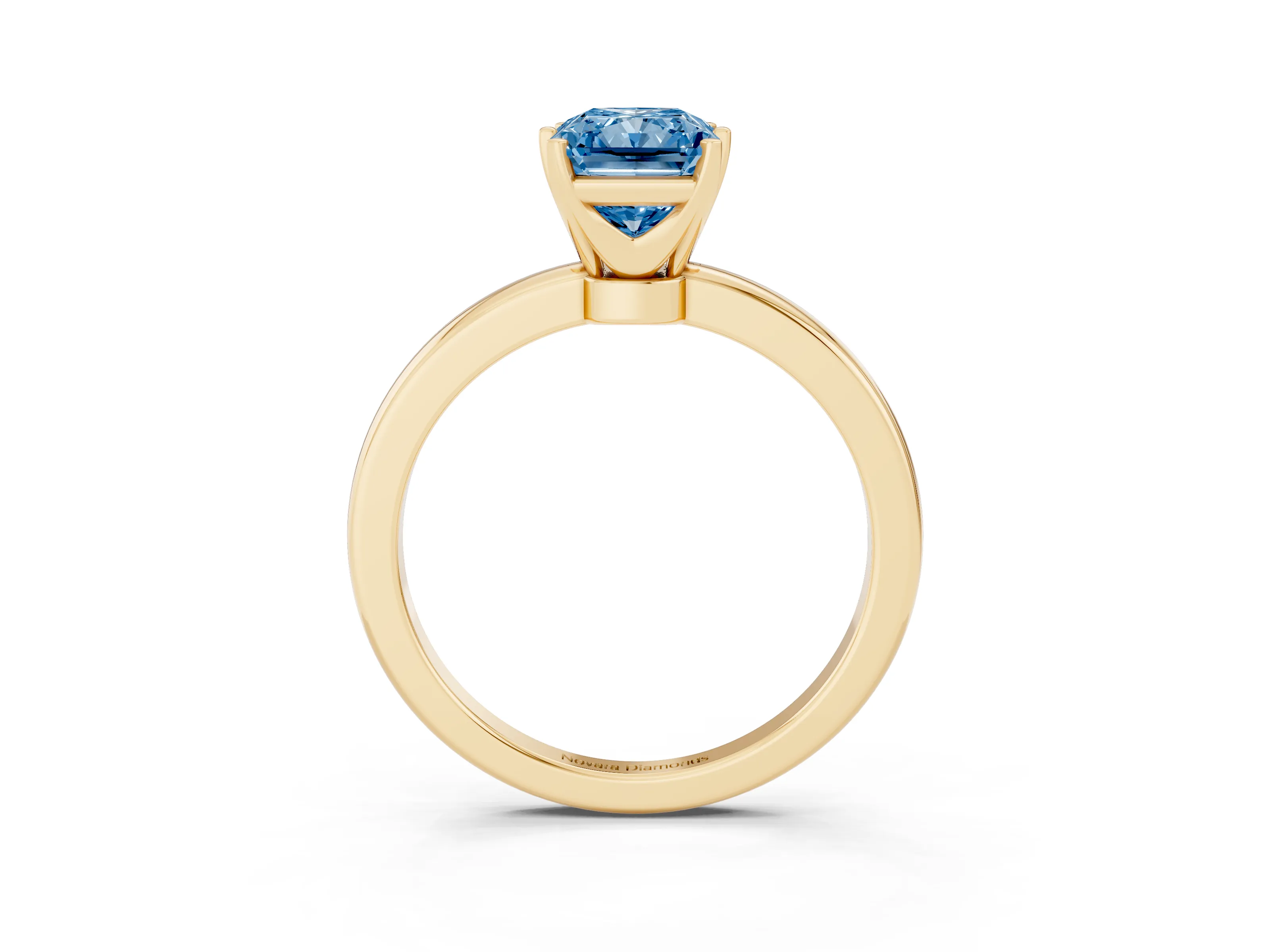 Fancy Blue Radiant Cut Diamond Solitaire Ring Set in Yellow gold with Raised Prong Setting on a Classic Band