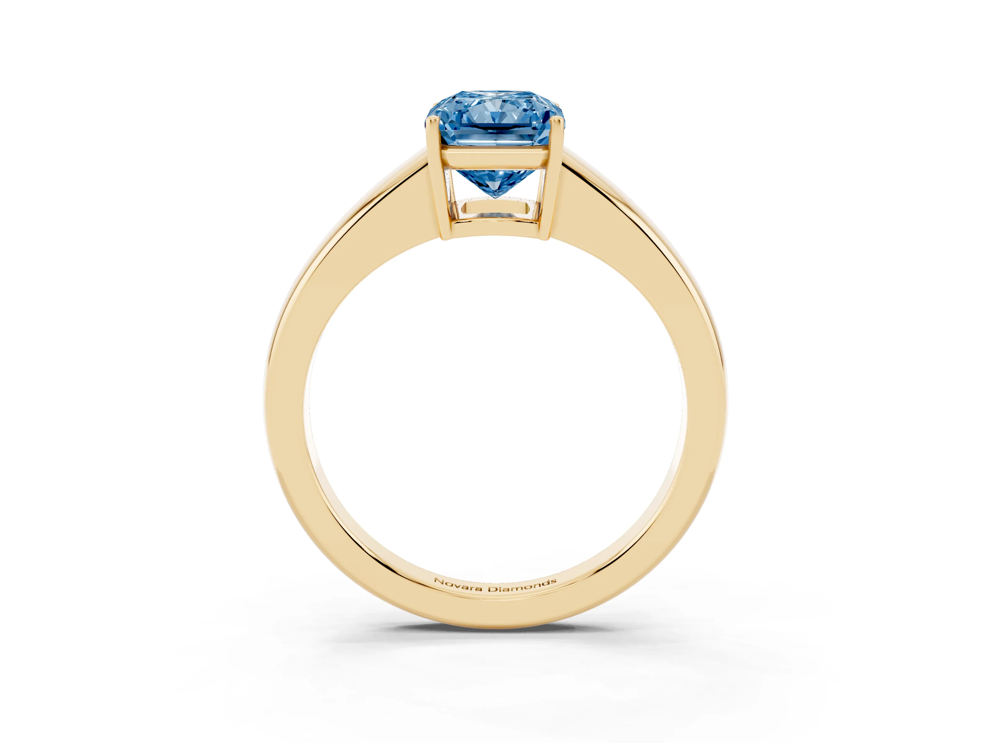 Fancy Blue Radiant Cut Diamond Solitaire Ring Set in Yellow gold with Tapered Band and Prong Setting