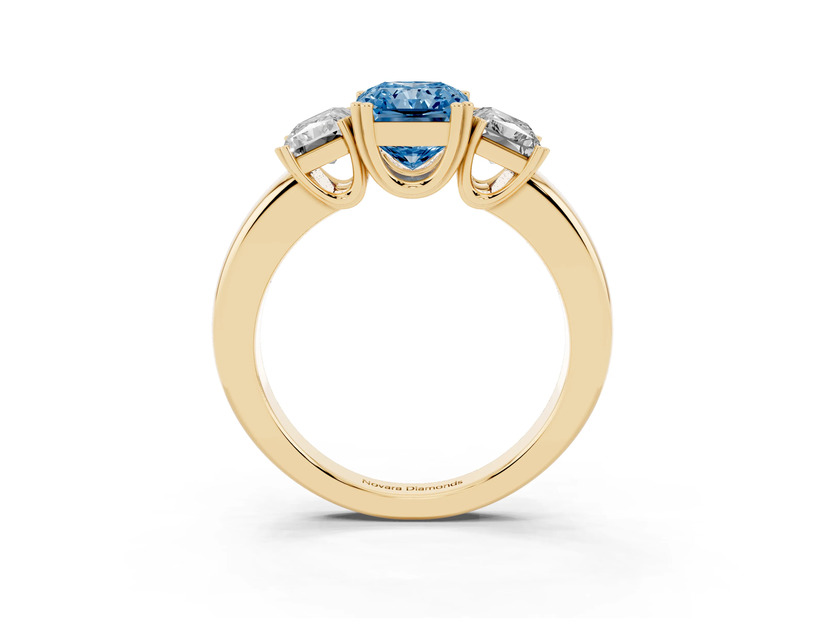 Fancy Blue Radiant Cut Diamond Three-Stone Ring Set in Yellow gold with Polished Channel-Set Band