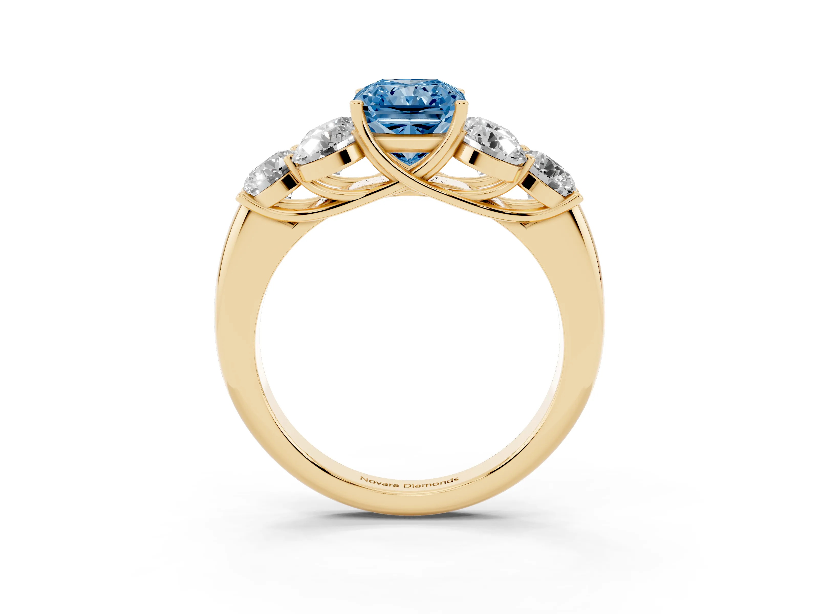 Fancy Blue Radiant Cut Diamond Cluster Ring Set in Yellow gold with Round Accent Stones and Prong Setting on a Plain Band