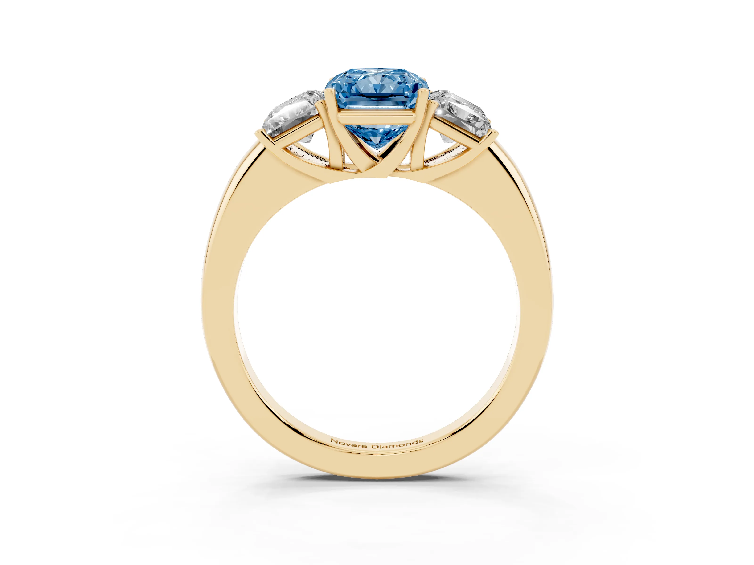 Fancy Blue Radiant Cut Diamond Three-Stone Ring Set in Yellow gold with Bold Center and Classic Band