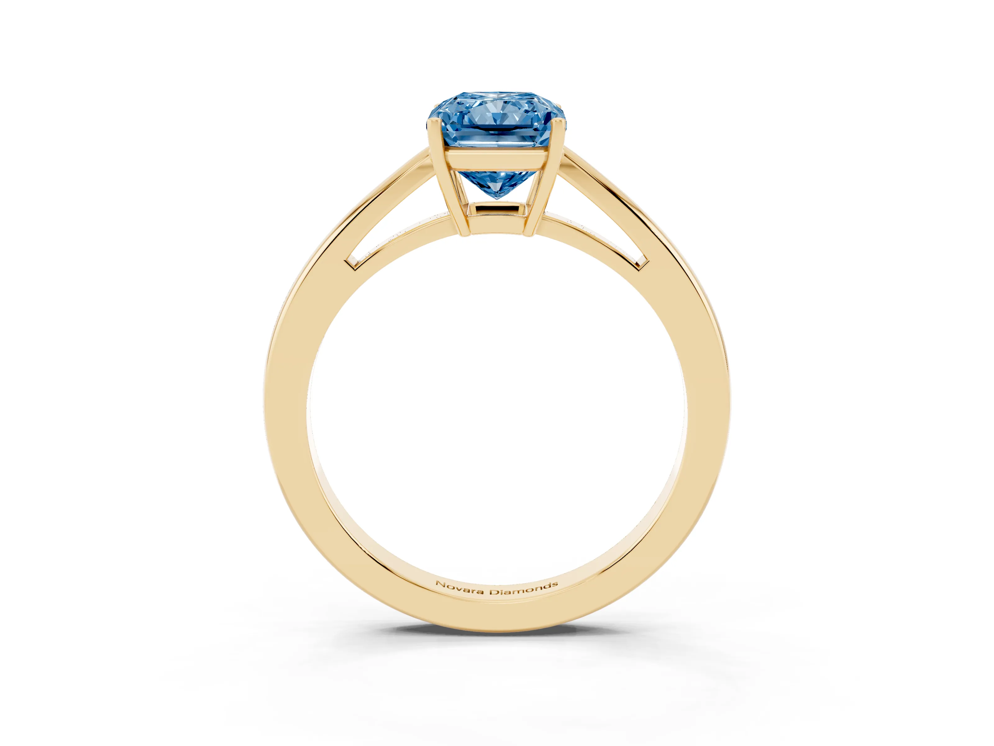 Fancy Blue Radiant Cut Diamond Solitaire Ring Set in Yellow gold with Split Shank and Prong Setting