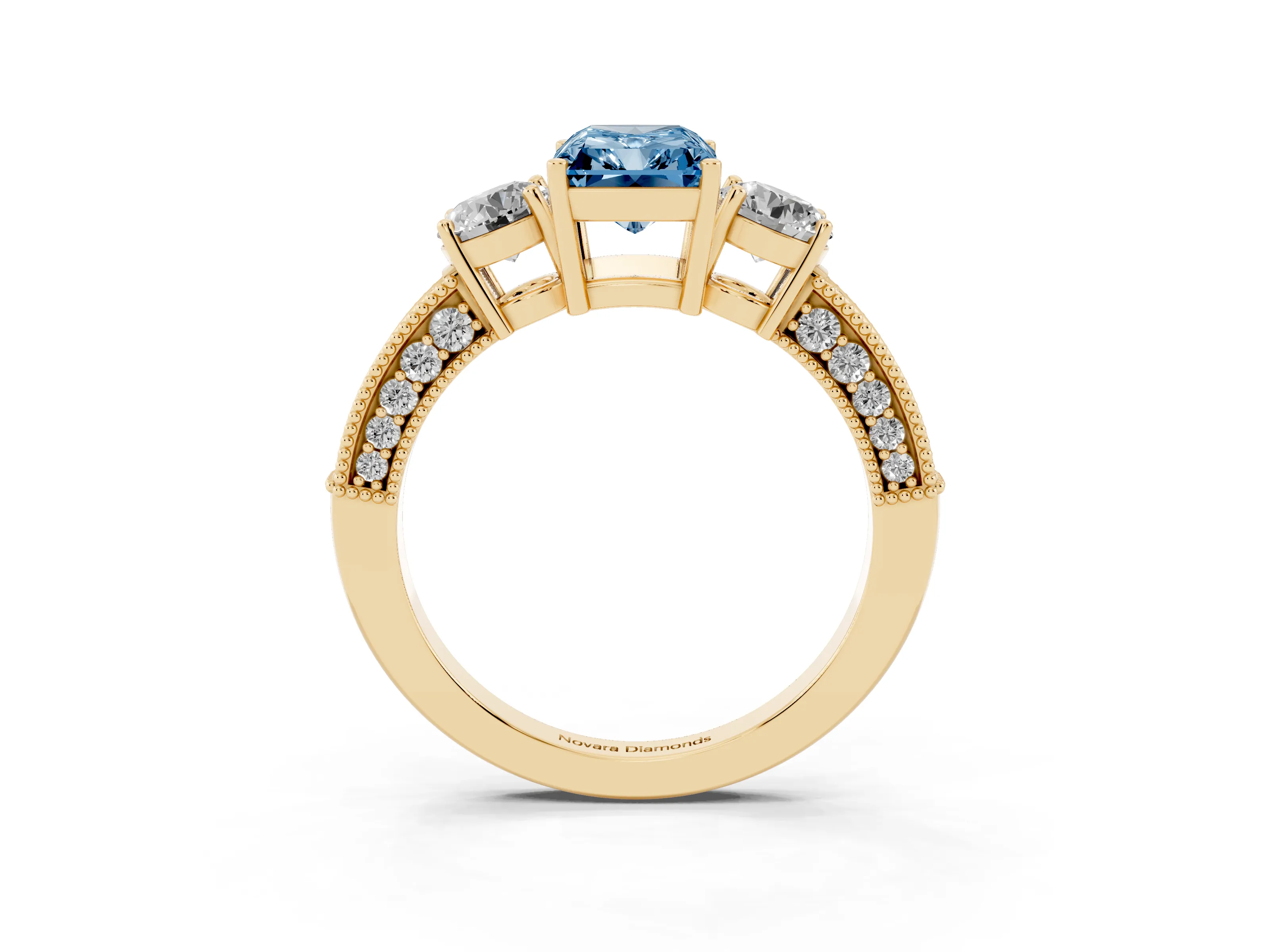 Fancy Blue Radiant Cut Diamond Three-Stone Ring Set in Yellow gold with Round Side Stones and Pavé Band