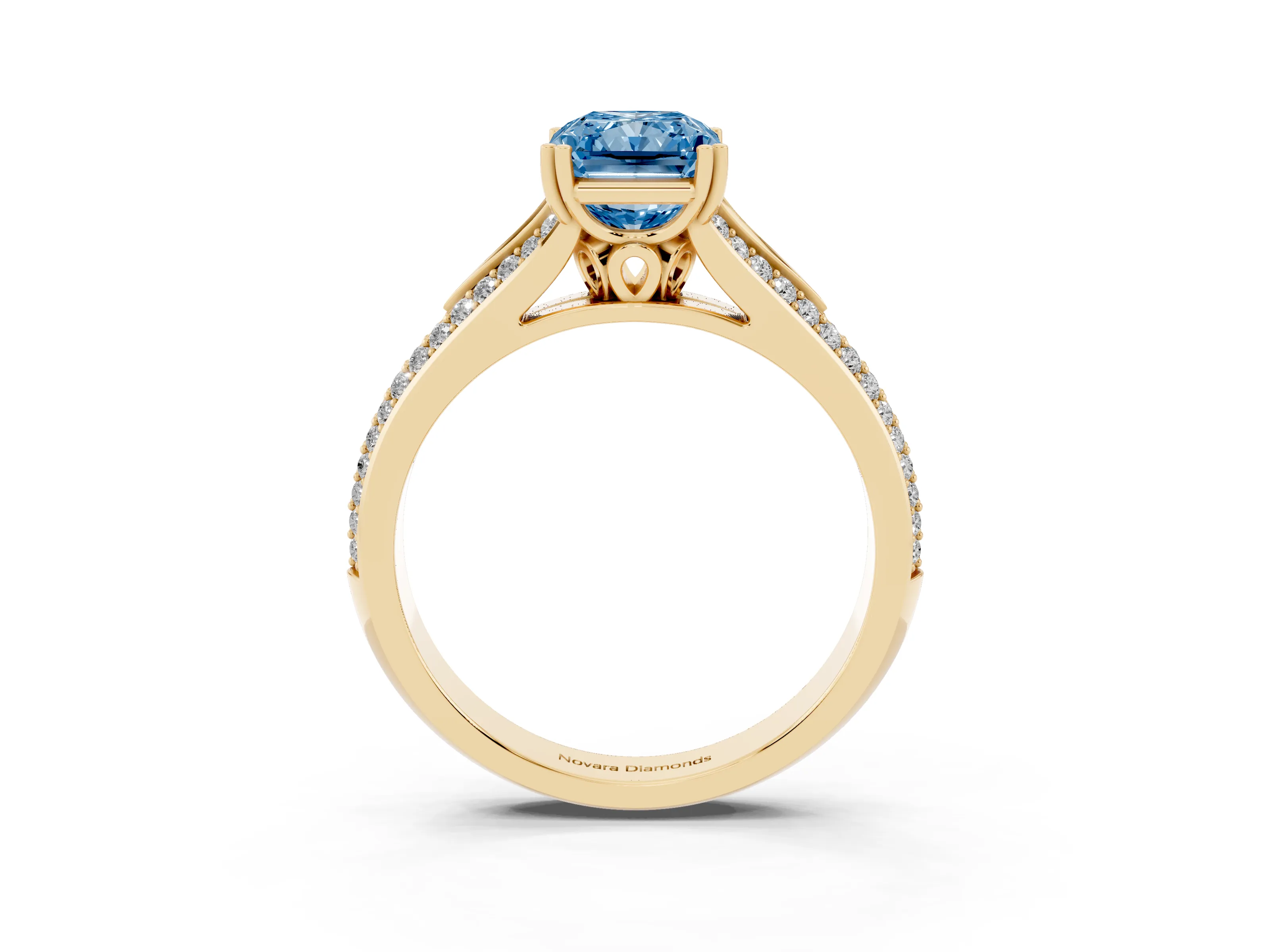 Fancy Blue Radiant Cut Diamond Split Shank Pavé Engagement Ring Set in Yellow gold with Prong-Set Center Stone
