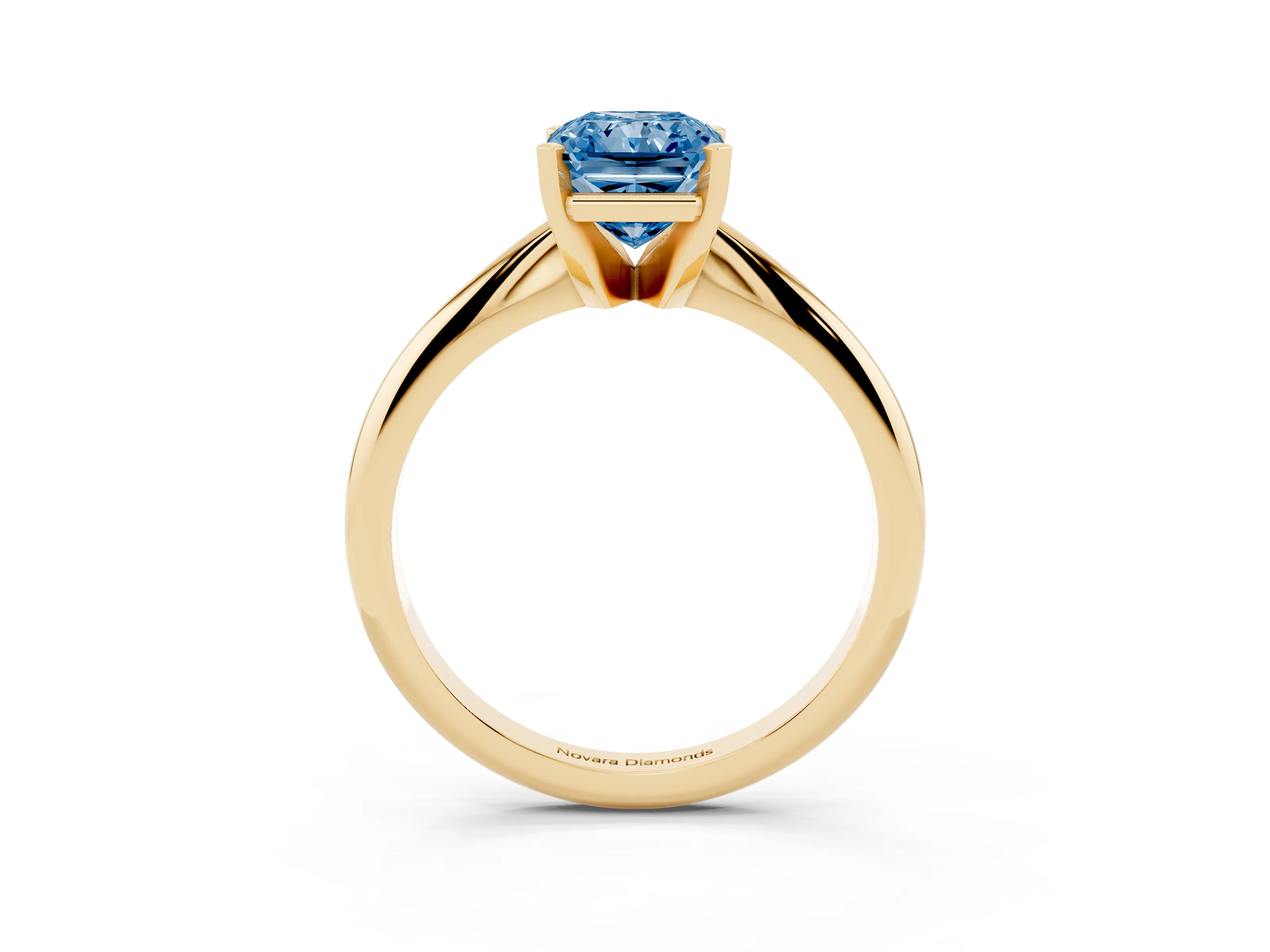 Fancy Blue Radiant Cut Diamond Solitaire Ring Set in Yellow gold with Prong Setting on a Plain Round Band