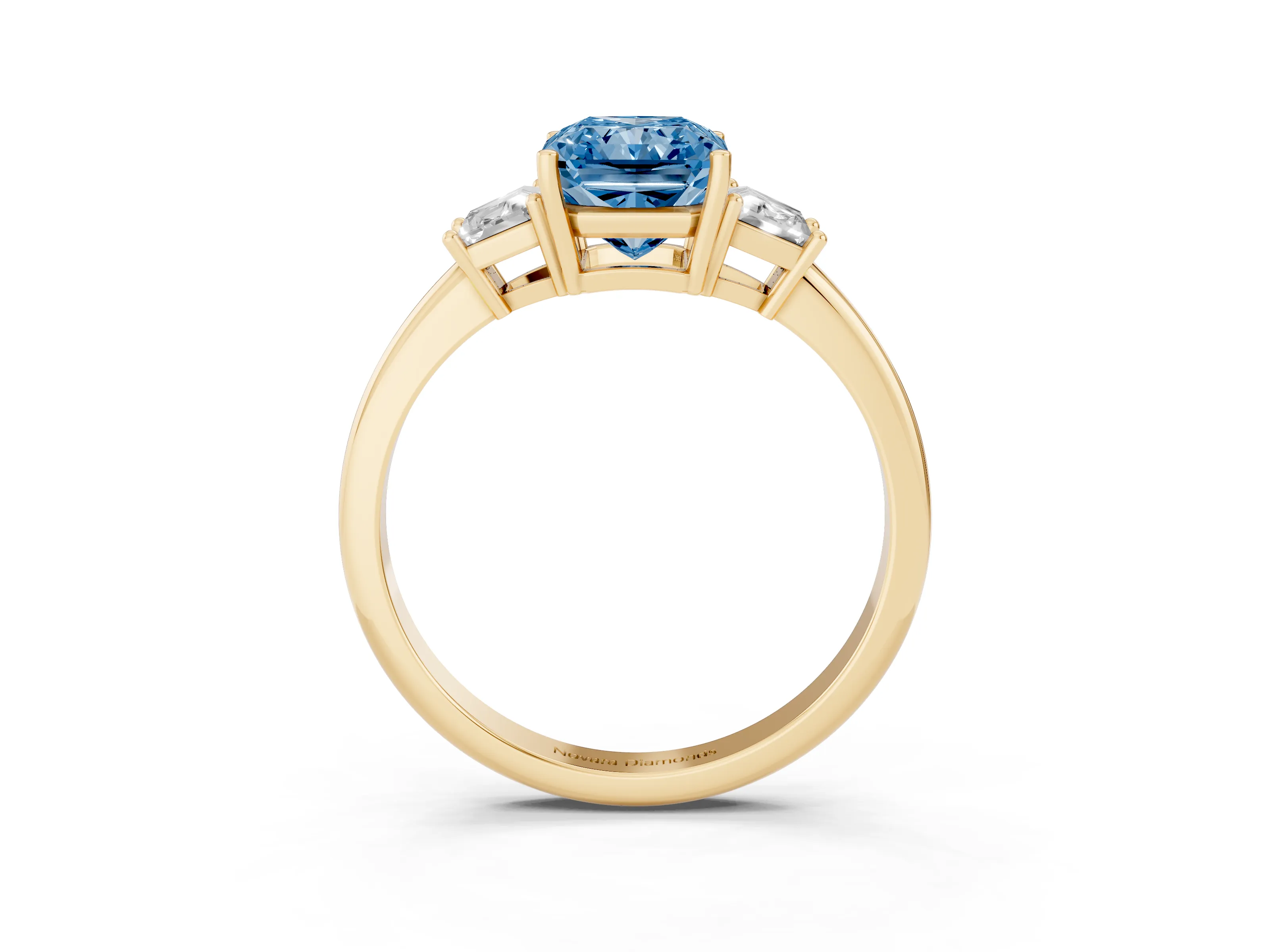 Fancy Blue Radiant Cut Diamond Three-Stone Ring Set in Yellow gold with Trapezoid Side Stones and Prong Setting