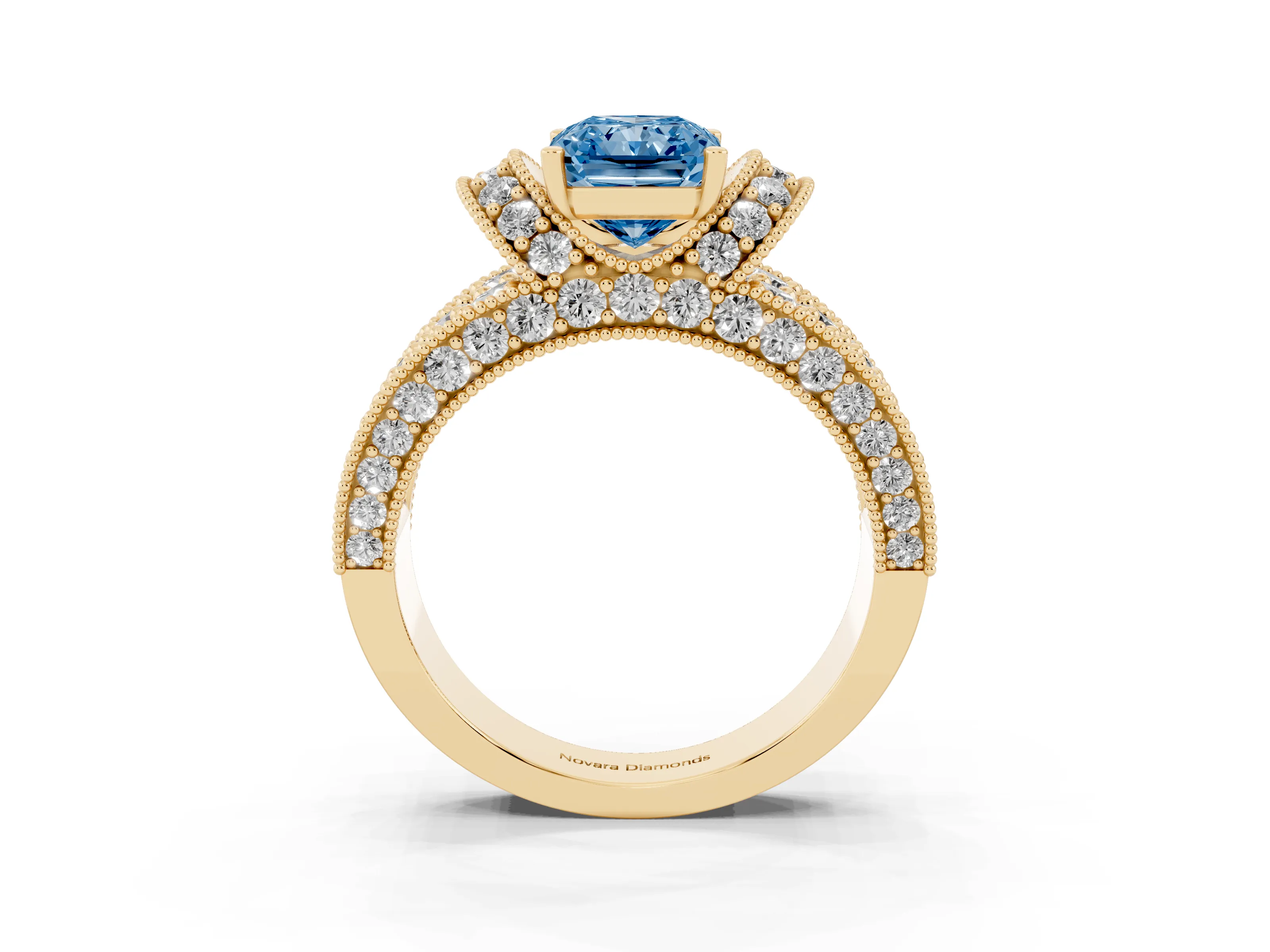 Fancy Blue Radiant Cut Diamond Milgrain Halo Pavé Engagement Ring Set in Yellow gold with Prong Setting