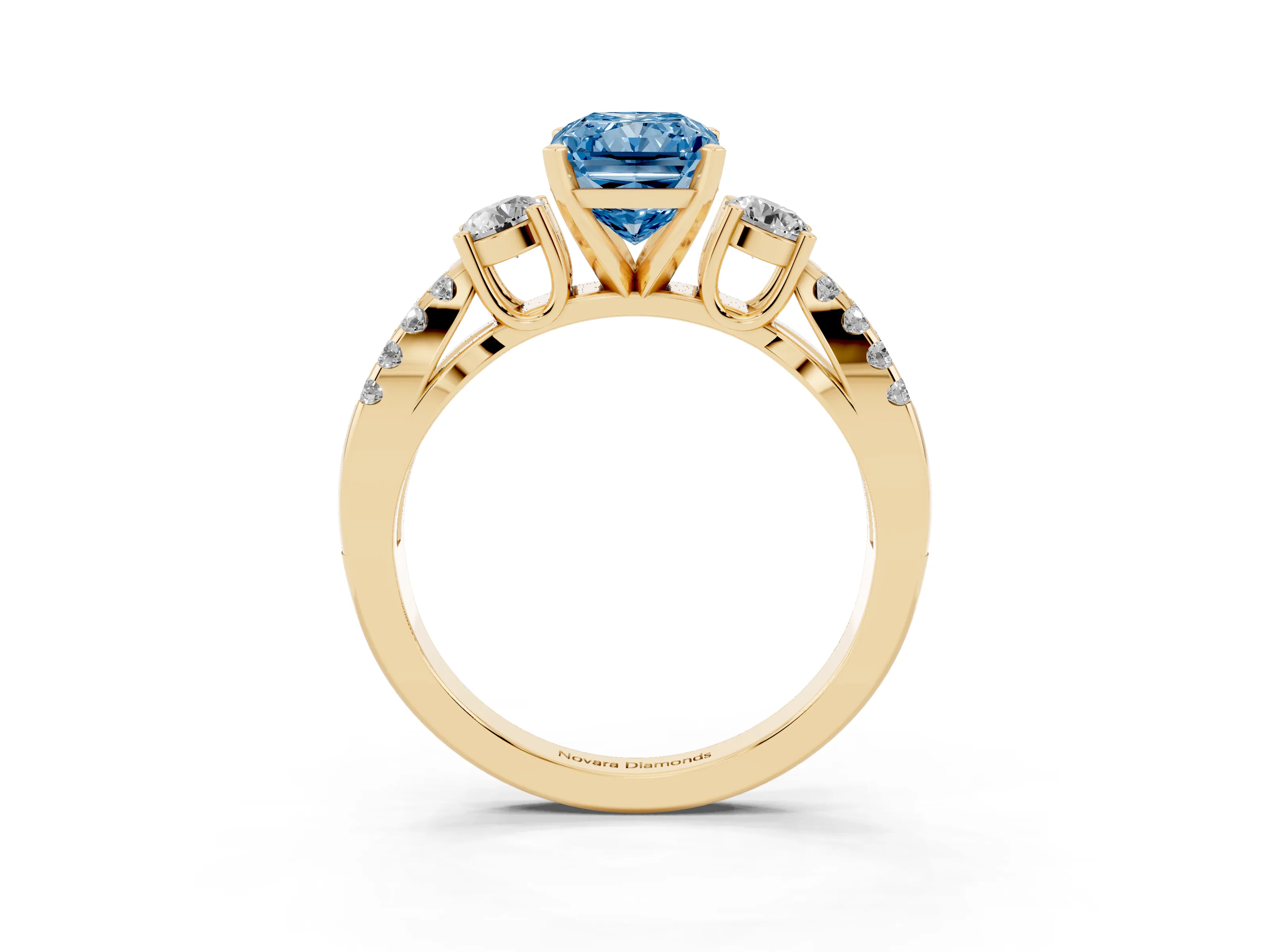 Fancy Blue Radiant Cut Diamond Three-Stone Ring Set in Yellow gold with Pavé Split Shank and Prong Setting