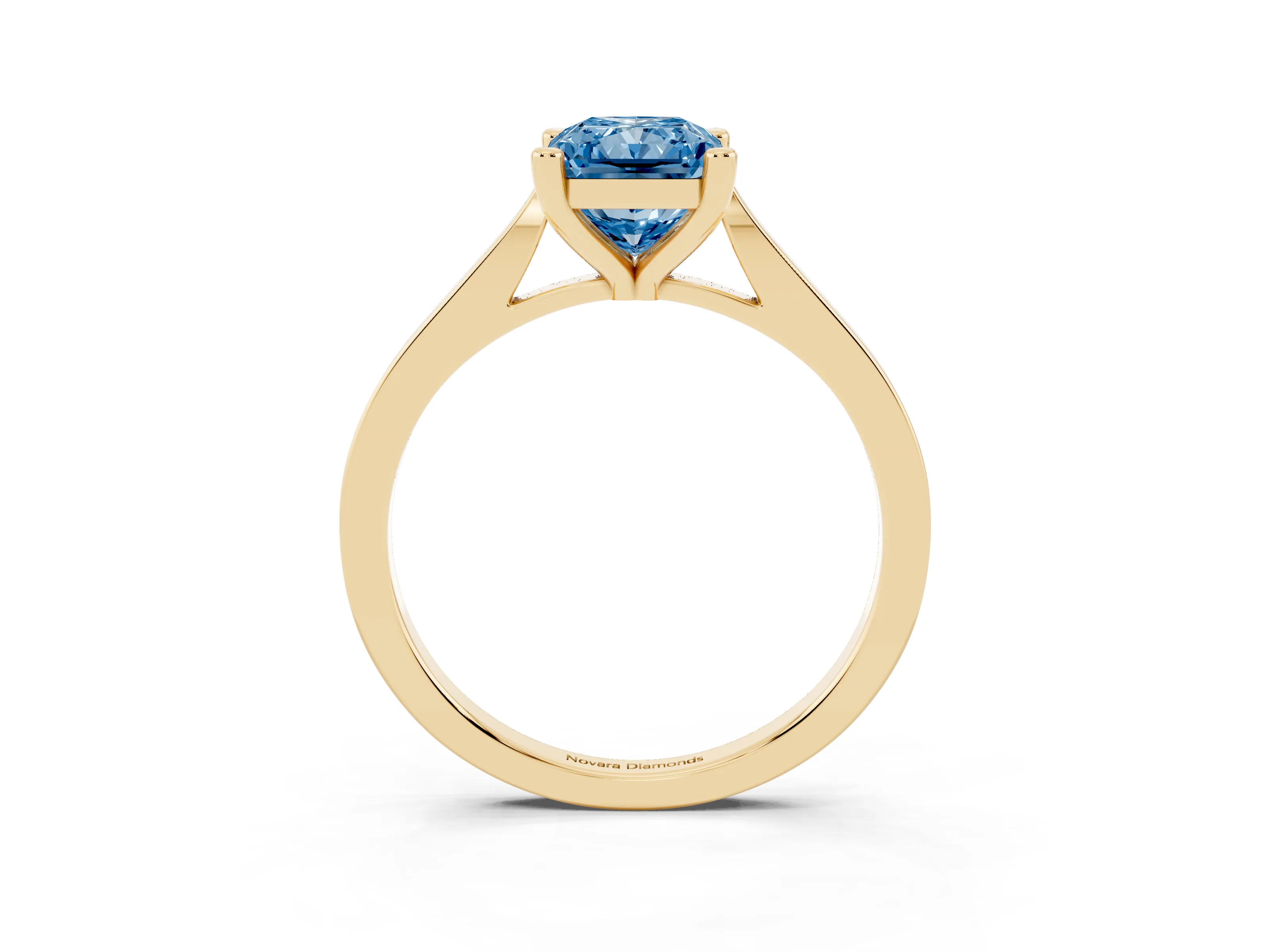 Fancy Blue Radiant Cut Diamond Solitaire Ring Set in Yellow gold with Prong Setting and Tapered Band