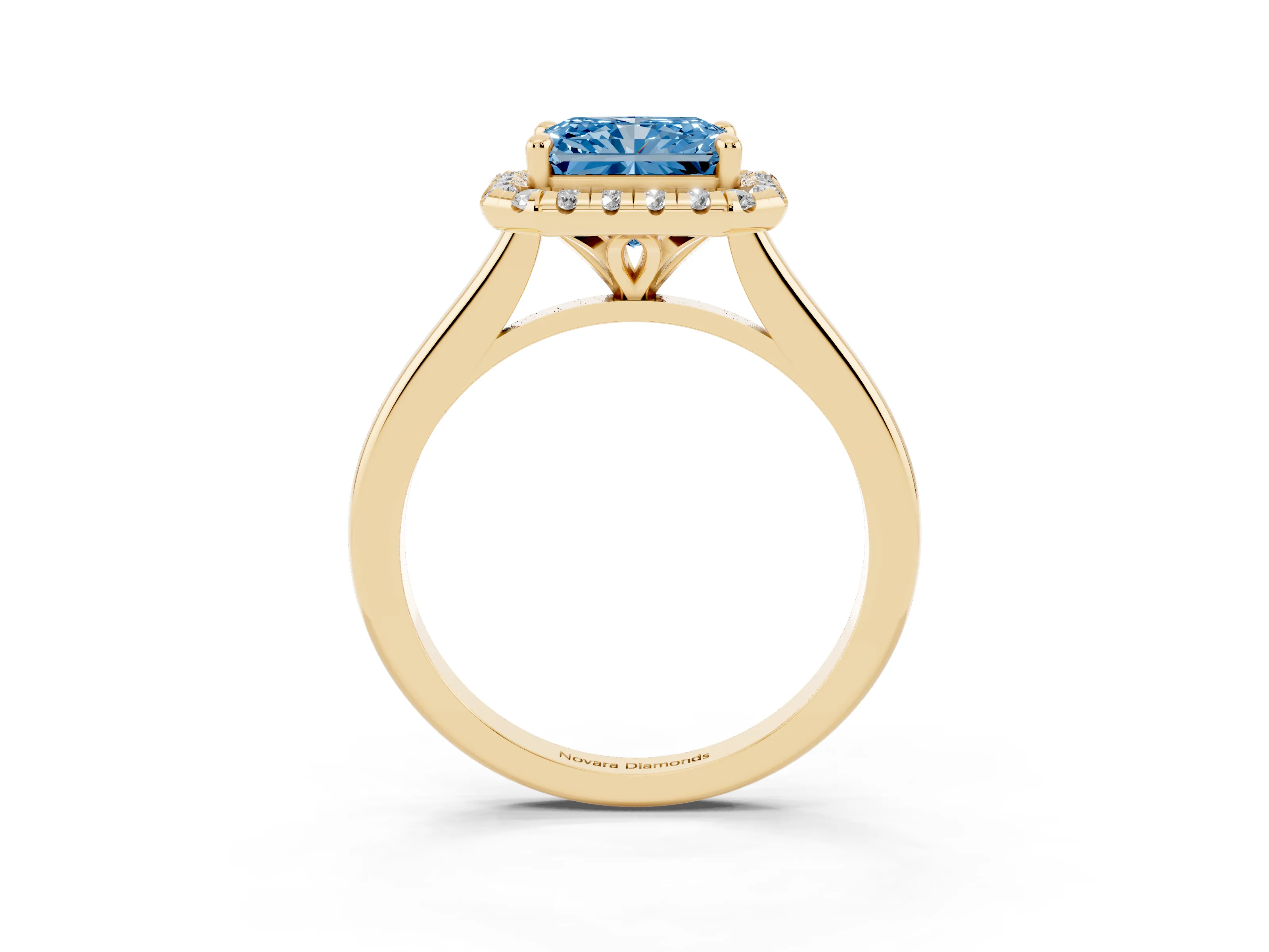 Fancy Blue Radiant Cut Diamond Halo Engagement Ring Set in Yellow gold with Pavé Band and Rising Shoulders