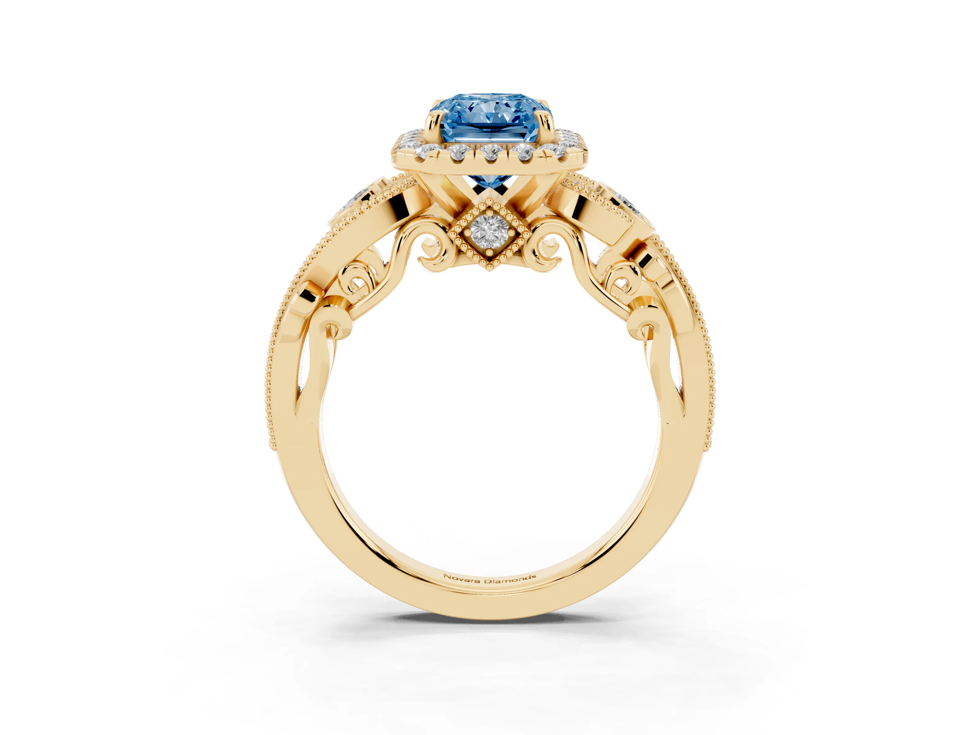 Fancy Blue Radiant Cut Diamond Halo Ring Set in Yellow gold with Milgrain Pavé Band and Prong Setting