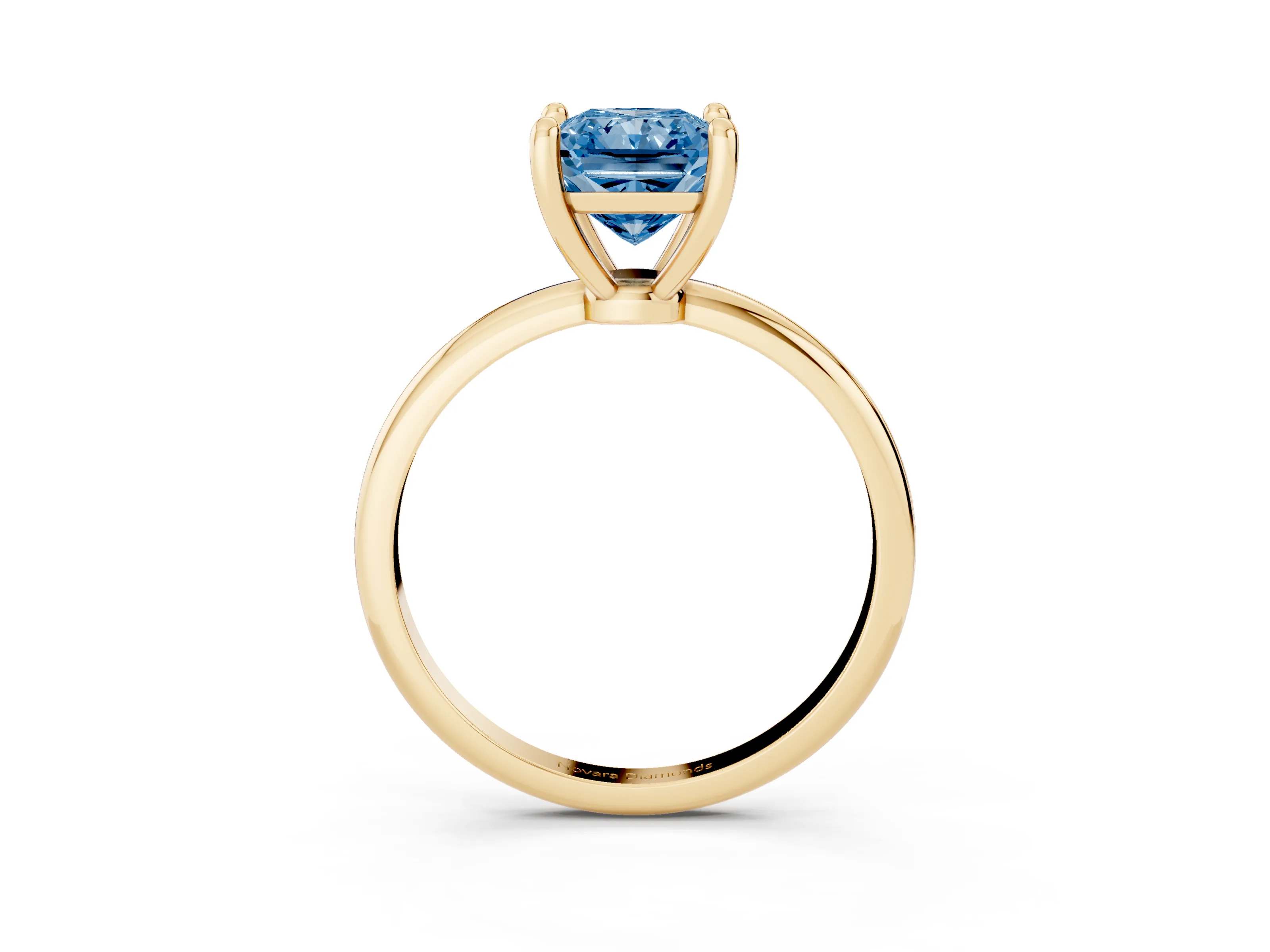Fancy Blue Radiant Cut Diamond Solitaire Ring Set in Yellow gold with Secure Prong Setting on a Classic Band