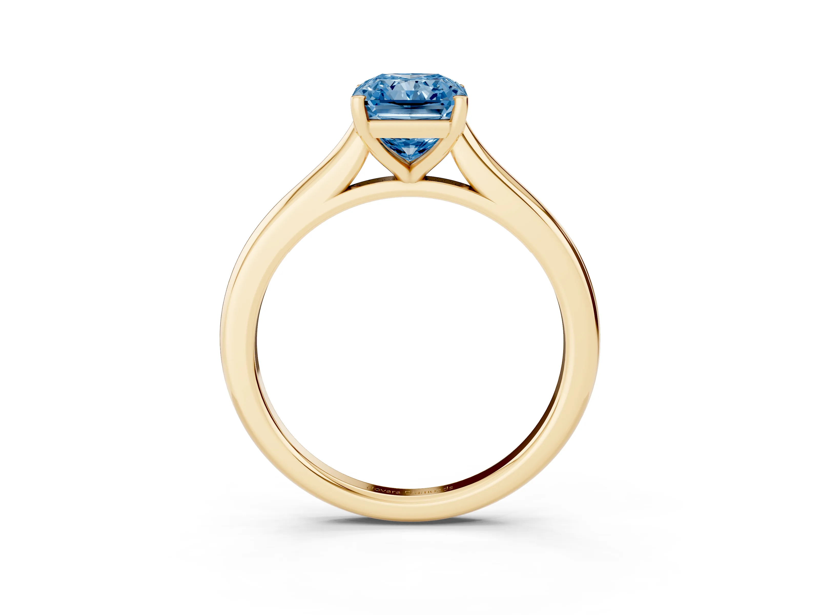 Fancy Blue Radiant Cut Diamond Solitaire Ring Set in Yellow gold with Cathedral Band and Prong Setting