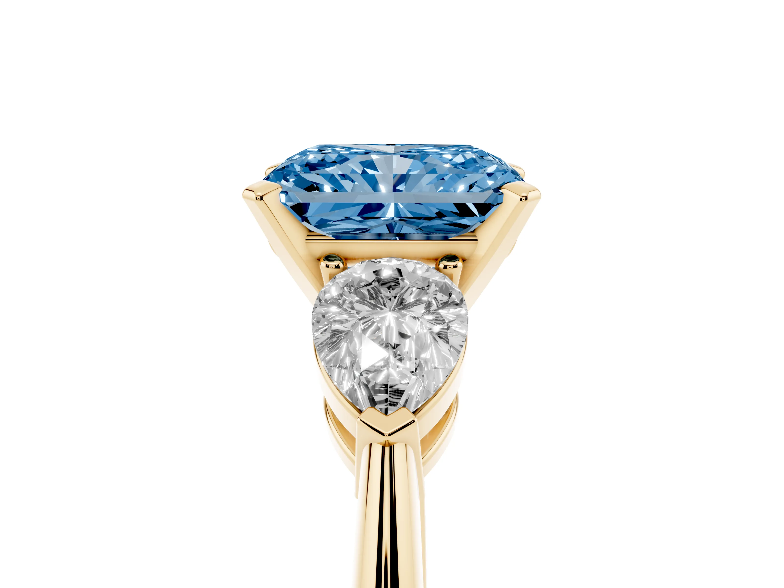 Fancy Blue Three-Stone Radiant Cut Diamond Ring Set in Yellow gold with Pear Side Stones and Prong Setting
