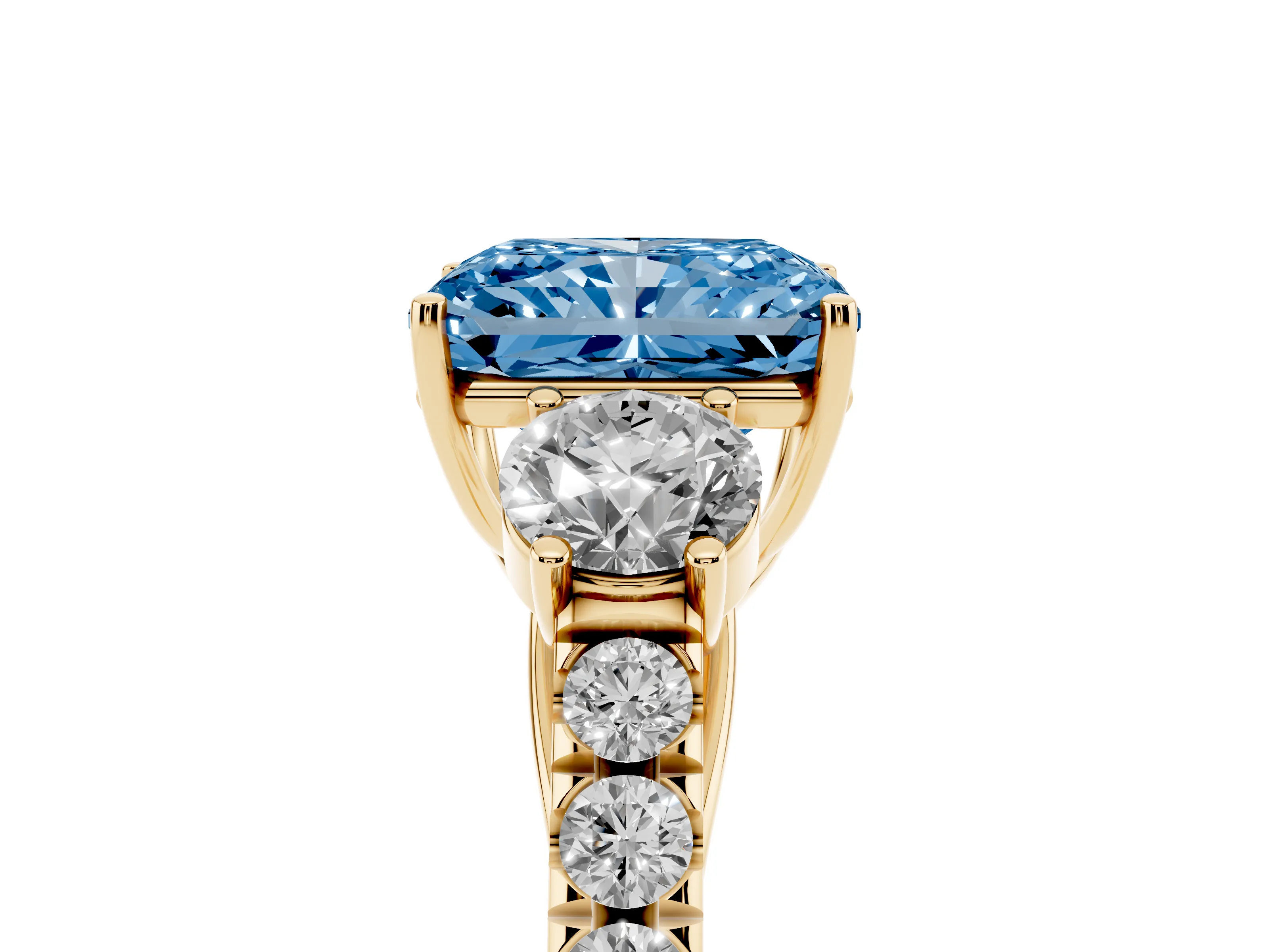 Fancy Blue Radiant Cut Diamond Three-Stone Ring Set in Yellow gold with Round Side Stones and Delicate Pavé Band