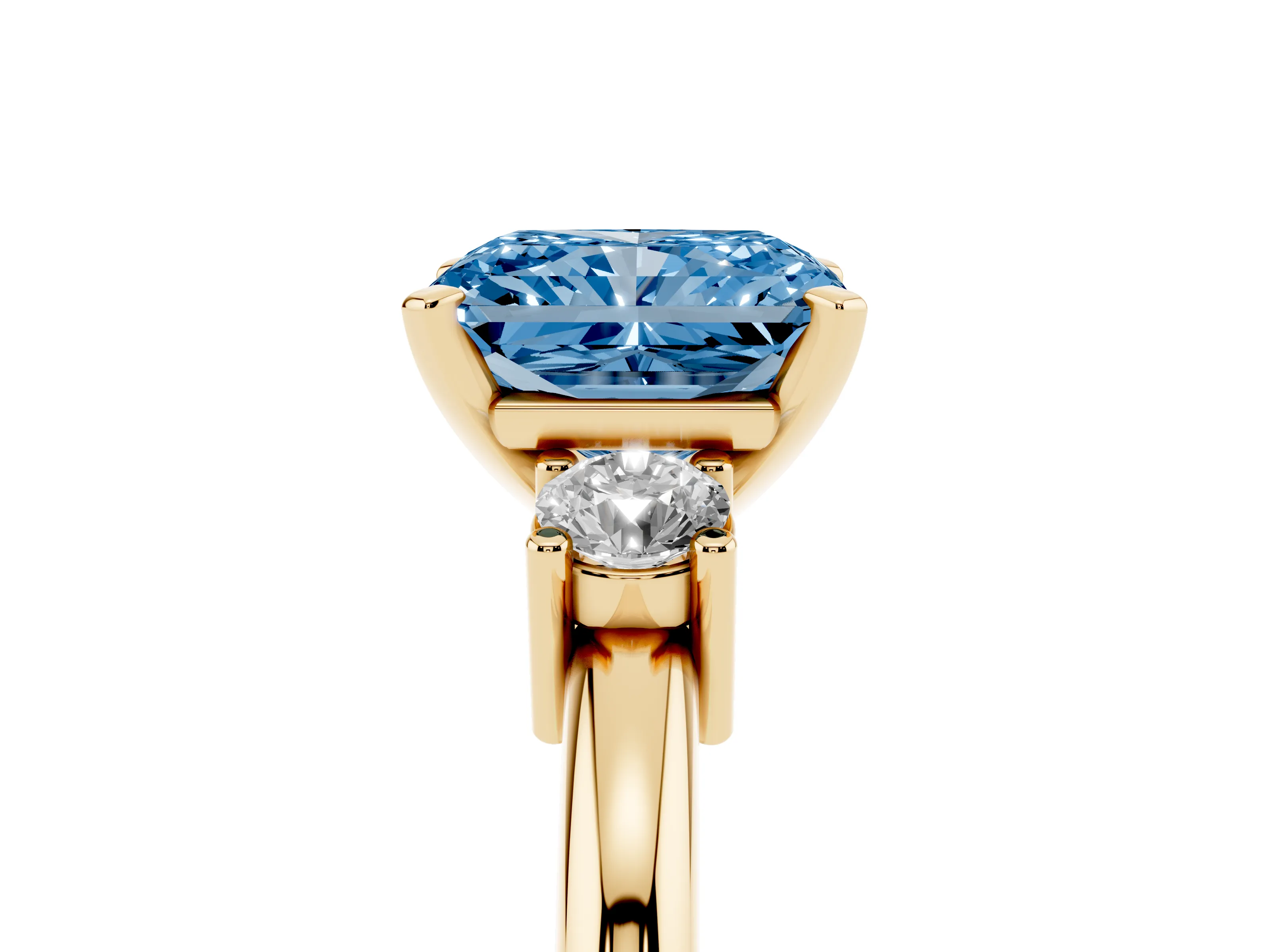 Fancy Blue Three-Stone Radiant Cut Diamond Ring Set in Yellow gold with Prong Setting and Plain Band
