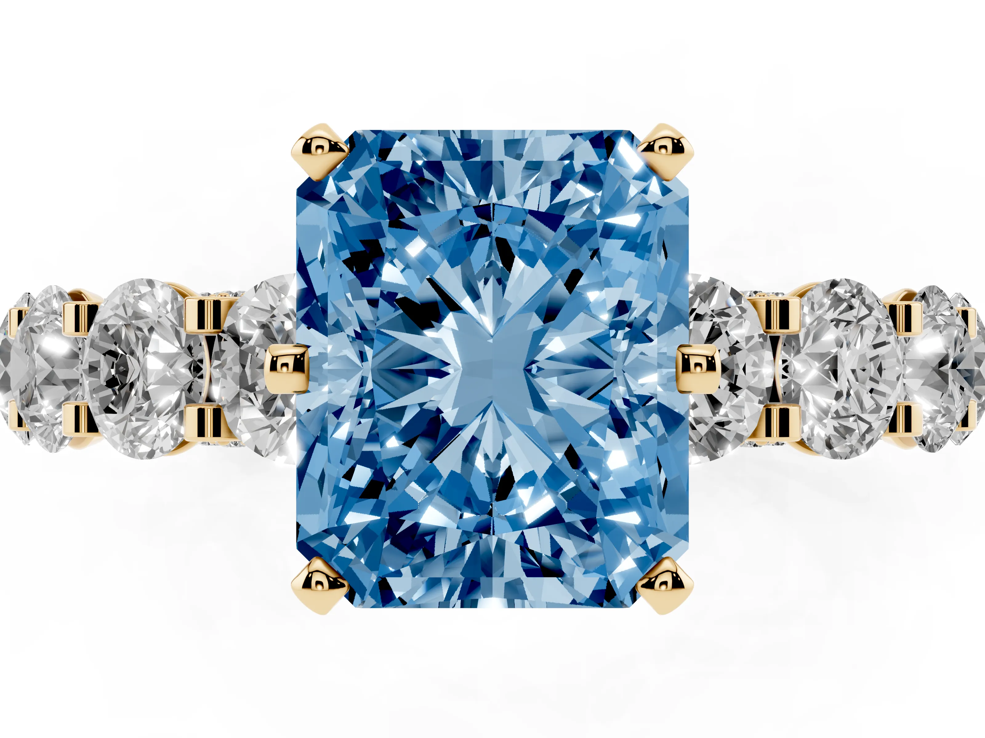 Fancy Blue Radiant Cut Diamond Side Stone Ring Set in Yellow gold with Alternating Round and Oval Side Stones